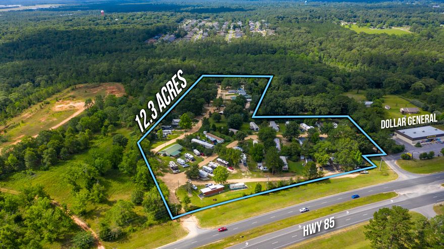FANTASTIC INVESTMENT OPPORTUNITY! Blueberry Country Estates is an established Mobile Home and RV Park situated on over 12 acres and located on Hwy 85. Great accessibility w/ the location being on a main highway, approximately 7 miles from I-10 and 30 miles to Hwy 331 N. A unique train caboose serves as the office building and sits at the entry of the park. Boasting 26 Mobile Home lots, 27 RV spots as well as a duplex and a 28' X 84'' w/ 6 bay   garage/workshop makes this quite a versatile establishment.  An additional 28' x 30' building w/ AC on the property could be converted into a laundry mat.  Each RV lot has all the access you need including 30 and 50 amp lots. Great occupancy! Additional information will be supplied upon request and to serious buyers only.
