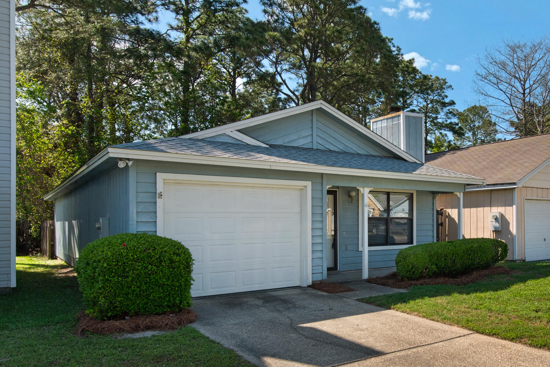 Delightful Valparaiso Florida home shines with style! Living room with rich wood floors, fieldstone fireplace, cathedral ceiling and French doors to side yard. Neat kitchen with tile backsplash. Pleasing three bedroom layout, master bedroom with full bath. Living room/dining room combo makes home feel spacious! Brand new roof and brand new hot water heater - March 2025. Fenced yard. Convenient location to amenities, shopping, highway, facilities and Eglin AFB. Your home awaits!