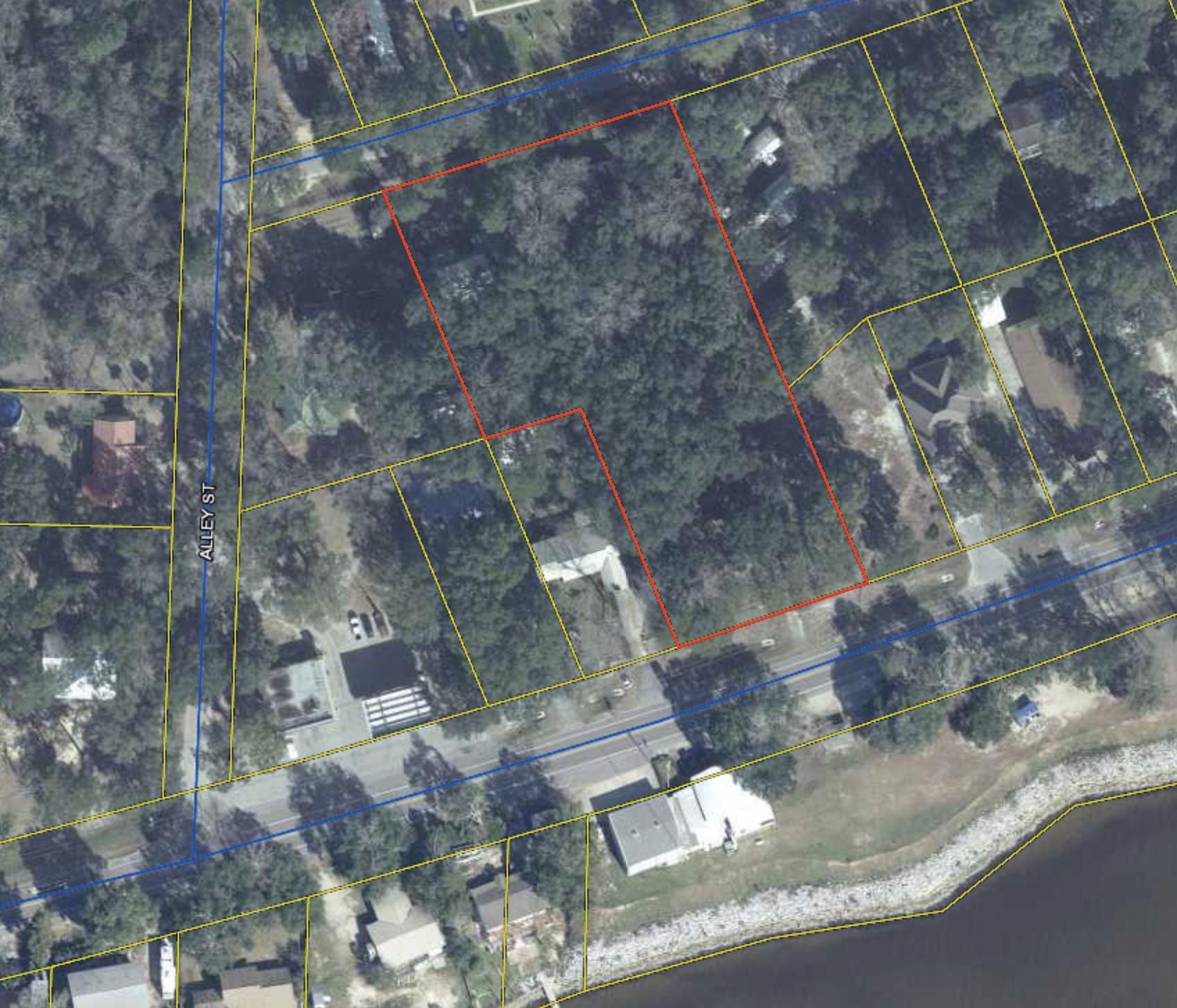 BY APPOINTMENT ONLY - Perfect for a mini-farm, private estate or family compound. Property consists of 1.72 unrestricted acres with old oak trees and unobstructed view of Choctawhatchee Bay. This is one of the last large pieces of property with a water view on the North side of Choctawhatchee Bay. Property consists of: Brick home built in 1965. Home is clean and in good condition, but needs to be totally updated (likely to include wiring, a new roof and new HVAC system- unlikely will qualify for financing). On the north side of the property is a manufactured home (double wide) in very good condition with an updated kitchen on community water service. There's also a 2 story barn with 2 chicken coops below and storage above, workshop, plant house, large storage building .....