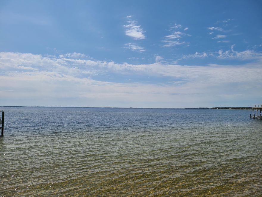 Welcome to Casa Marina! This beautiful vacant lot is one of the  two only remaining in this gorgeous gated community.  Stunning waterfront views of the Bay.  Here is your opportunity to build your dream home or vacation home on this gorgeous lot that offers incredible waterfront views. Centrally located to the white sandy beaches of the Emerald Coast and Eglin Air Force Base.  Buyer to verify all areas of importance including,  but not limited to lot size, zoning, measurement.