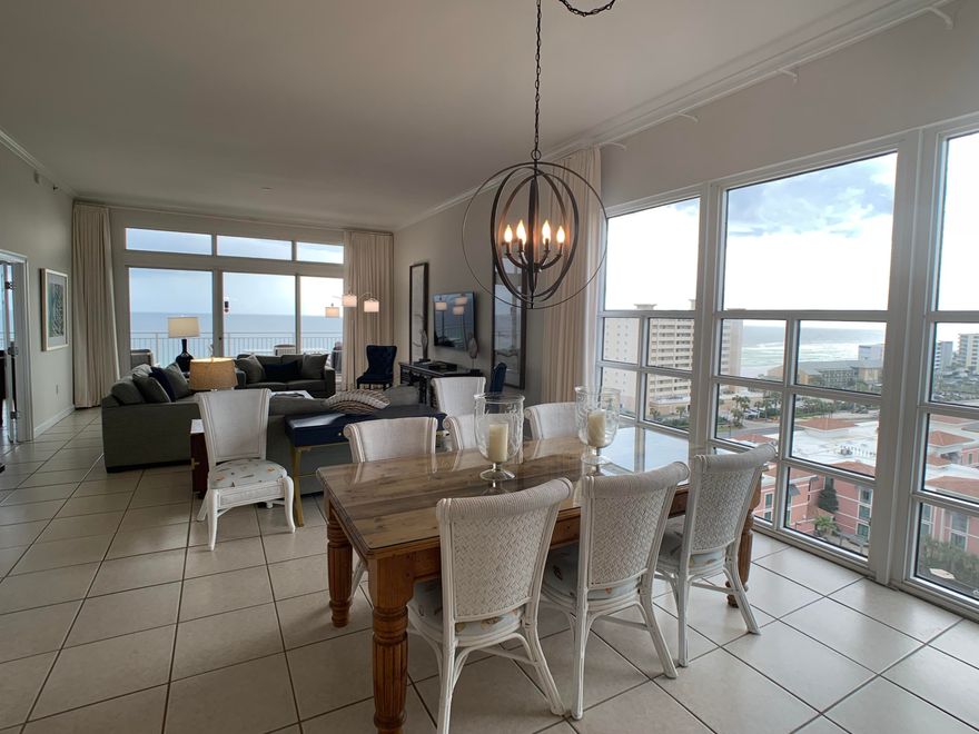 This sophisticated west corner penthouse residence effortlessly blends comfortable contemporary furnishings with tropical inspired style. Two walls of windows in the great room frame breathtaking views of the Gulf of Mexico and the city lights of Destin. Three comfortable bedrooms, one of which is a full lock-out unit with private balcony, provide accommodations for up to eight guests. The gourmet kitchen features a granite-topped bar and gleaming stainless steel appliances. A marble-topped full bar nearby makes this the perfect space for entertaining family and friends. 465sf of outdoor balconies offer the perfect perch for watching waterfront sunrises and year-round sunsets.