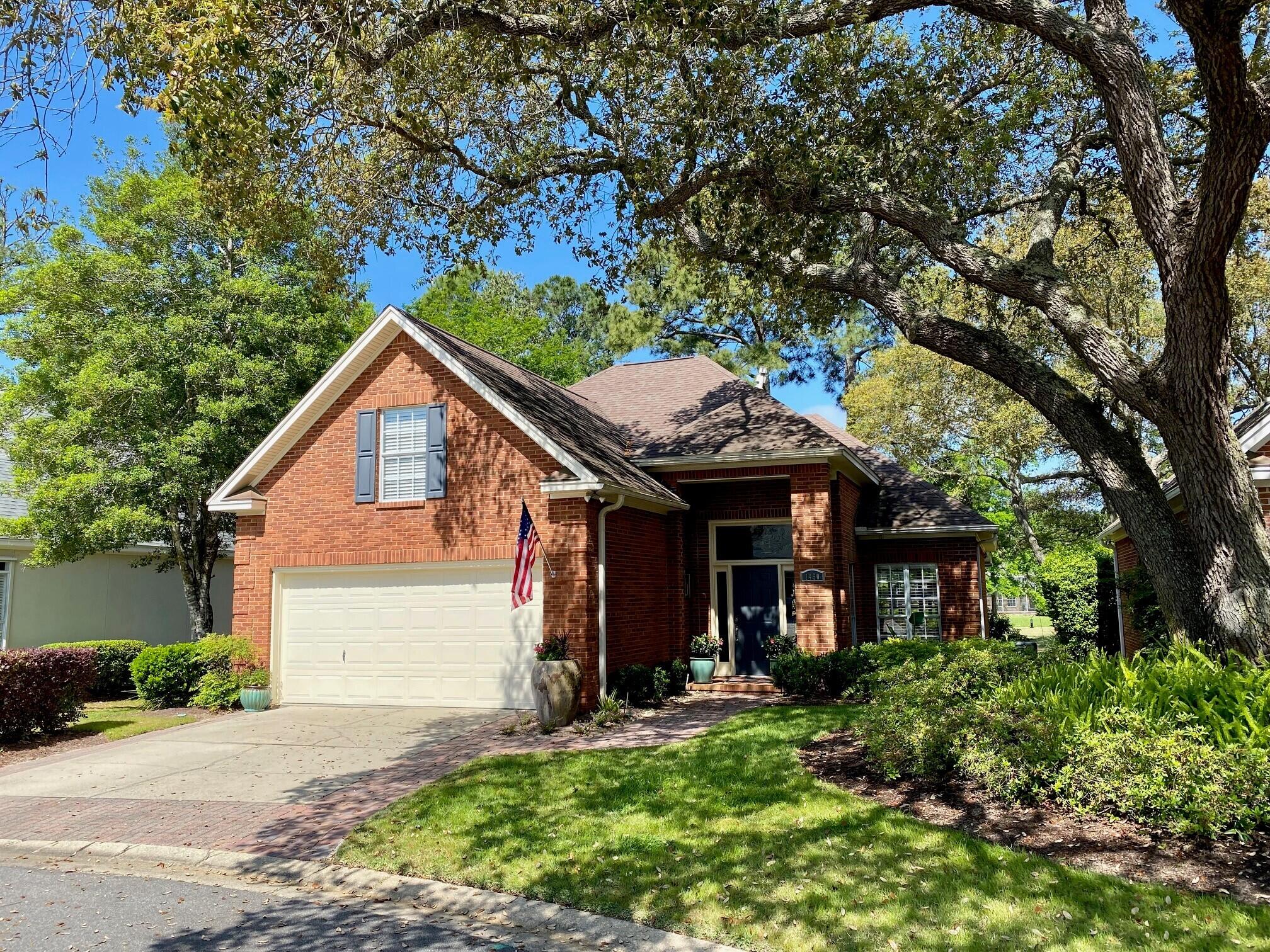 It's all about quality details with this updated all brick two-story home located at the end of a private cul-de-sac with views of the beautiful Bluewater Bay golf course. This home offers 4 generous bedrooms and 2.5 bathrooms. Master suite with bay window overlooking the golf course are on the first floor. You enter this home's foyer and are welcomed by tons of natural light, tall ceilings, LVP flooring, updated light fixtures with a gas, mosaic marble fireplace being the focal point of the living area. The kitchen has newer LG and Bosch appliances and includes a gas range and microwave with an extending ventilation feature. Tall upper cabinets are complimented by neutral solid surface countertops and new tile backsplash. Additional features: whole house water filtration system,