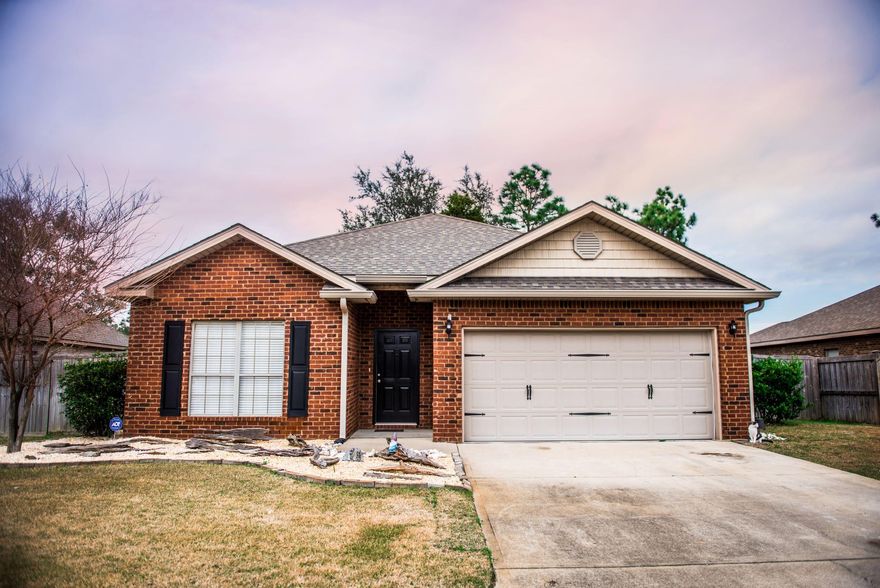 This gorgeous 4 bedroom 2 bath home in the Peach Creek community is minutes away from beautiful 30A and a short drive to all the fun of Pier Park, Sandestin, and all the beautiful beaches in between! Porcelain tile floors in entry way, living room, dining room, and kitchen. Open floor plan with tray ceilings in the living room that opens up to the dining area and kitchen. The large kitchen has Granite counters & breakfast bar, black appliances, large pantry and lots of cabinet space.
Huge master bedroom with tray ceilings and en suite bathroom with large walk-in closet, double vanity, large garden tub, and walk-in shower. Spacious guest bathroom and carpet in 2 additional bedrooms. The fourth bedroom located in the front of the home makes the perfect home office.
Enjoy your own relaxing