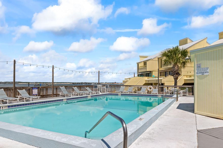 Luxurious unparalleled coastal beauty in Paradise awaits you! Swaying Palms, Gorgeous Waterfront Views, Boat Slip with 7500lb Boat Lift! Come live where others vacation! View Captivating Sunsets, Rare Townhome is a dream come true for anyone seeking a picturesque waterfront retreat. With its amazing sunset views and water vistas from every room, you'll feel like you're living in a postcard. The inclusion of a boat slip and boat lift makes it perfect for water enthusiasts, offering easy access to adventures on the water. Completely updated with $250k in upgrades this townhome features Custom hardwood Expresso cabinetry, large pantry with soft close pull out drawers; quartz counter tops in ALL bathrooms and kitchen. Kitchen features an Induction cooktop, convection oven, built-in microwave both with standard and convection options, warming drawer and 2 sinks and 2 disposals; Beveled quartz, indirect lighting; 3 ft wide countertop, Upscale large refrigerator, Lazy susan in the corner cabinets; Home has 19 travertine tile throughout; Upgrades include a tankless water heater, front load washer and dryer with custom cabinet enclosure and extra storage, Stairwell with landings are configured for and could be opened up for an elevator later if needed; Hurricane impact windows and doors on all levels; Neutral colors and shiplap add to the ambiance in rooms; Vaulted ceilings in master bedroom; Downstairs bedroom features Split unit, and hurricane door to patio to Pool! Remolded Full Bath has beautiful Tiled shower and upgraded lighting and fixtures; Middle level bedroom has pocket door to bath for convenience and beauty; Upstairs office suite includes MURPHY bed that doubles as a desk, LVP flooring and views to the Sound with custom UP/Down Blinds; Gorgeous views from the Master Bedroom and a deck for drinking that morning coffee or Sunset Drinks! Master Bath is totally renovated with Tiled shower AND relaxing garden tub; ADDITIONAL upgrades include: updated bathrooms with rimless glass, pocket doors, custom tiled showers, wireless lighting, High level countertops with two vanities in Master; Upstairs adjacent to the Master Bedroom is the captivating office suite; This room has a beautiful and functional Murphy Bed to give additional space for family and friends plus beautiful LVP flooring; Blinds are captivating with two directional levers; Lower level also has impeccable Bedroom Suite with Gorgeous upgraded Bath with Tiled Shower! Being sold furnished. Sound Front townhome with Panoramic views of the Santa Rosa Sound. You must see this unit to believe how great the Views are! The waterfront units rarely come open For Sale! A must see! Roof is 2005, but Metal for 30 year term;  HVAC new after Sally 2020! Thanks for showing this showcase home!