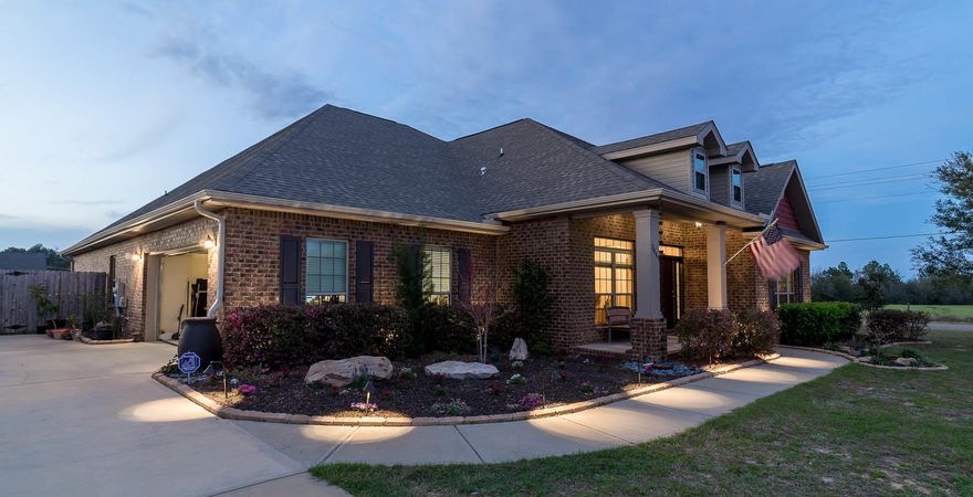 **Price reduced on this Gold Star Home!** Welcome to your new spacious corner lot home in the country. Enter from your lighted walkway and inside you will see columned archways leading into the formal dining room on the left and an office to your right. This home has a perfect mix of elegance and technology. The open floor plan of the kitchen, breakfast area, and family room provide a complete entertainment space. The master bedroom has vaulted tray ceilings with crown molding. The master bath has a double vanity with a granite countertop, garden tub, walk-in shower and a massive closet. The backyard is vast, with a 600 sq/f extended paver patio designed for BBQing. All this and more on over a half acre of land. A Must See Today!