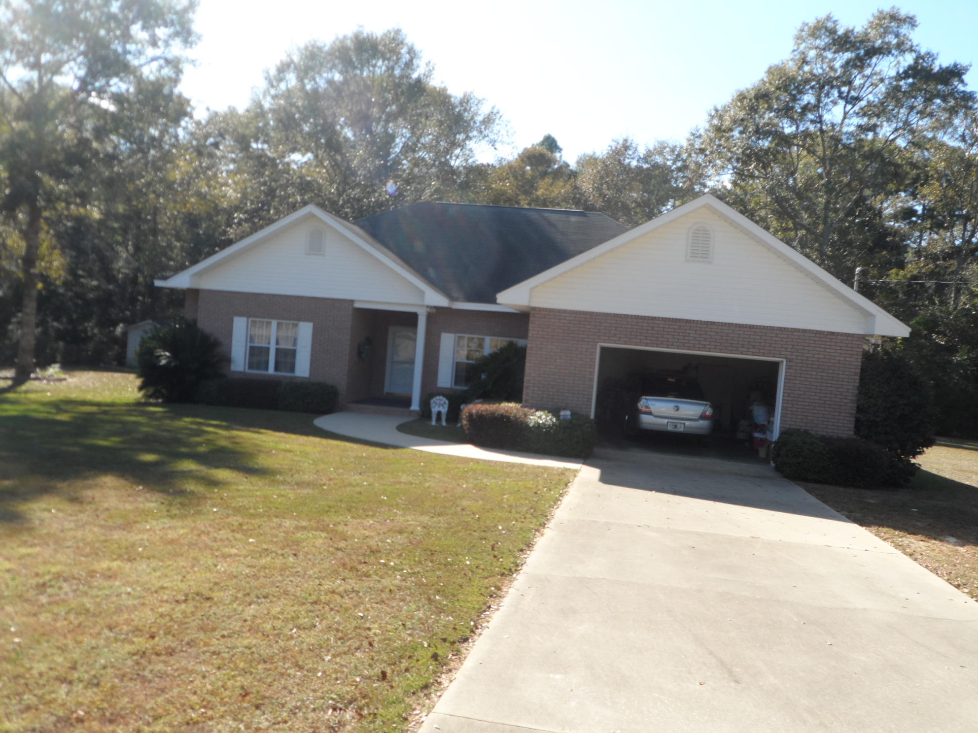 Like New House. Built in 2002 Person does not smoke or have pets. It is like new inside and out. It has 9 foot ceiling throughout the house. It it truely like new inside.It has a dream kitchen for room and cabinets. Open floor plan with formal living room and separate dining room plus a breakfast room. It has a very large heated and air sun porch to sit in the peace and quite of the day over looking the yard and the woods. It is a split bedroom plan. It has a large master bath. It has a study, nursery or sitting room attached to the master bedroom. It is a must see and a must buy at this price. Do not miss this one. Listing agent is niece of seller. Set at a low sell now price. So take a look today.Buyer to verify any information that is important to them