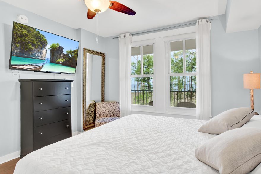 Absolutely beautiful Condo with fantastic views of the Choctawhatchee Bay. Enjoy water views from your private balcony, spacious living room, or even the comfort of your bed. The updated wood flooring looks great opening up the condo to have a larger feel. The many windows add lots of natural light. Whether this is an investment property, primary residence or second home, you will enjoy the beach and bay lifestyle all in one. You are a five minute stroll to Baytowne Wharf of Sandestin where every day is magical. Enjoy the shopping, dining, and entertainment for all ages. Bring your blanket and wine and enjoy the schedule of outdoor concerts, festivals and special events. Head to the Marina Grill for a fun filled afternoon of sports on the Big Screen.