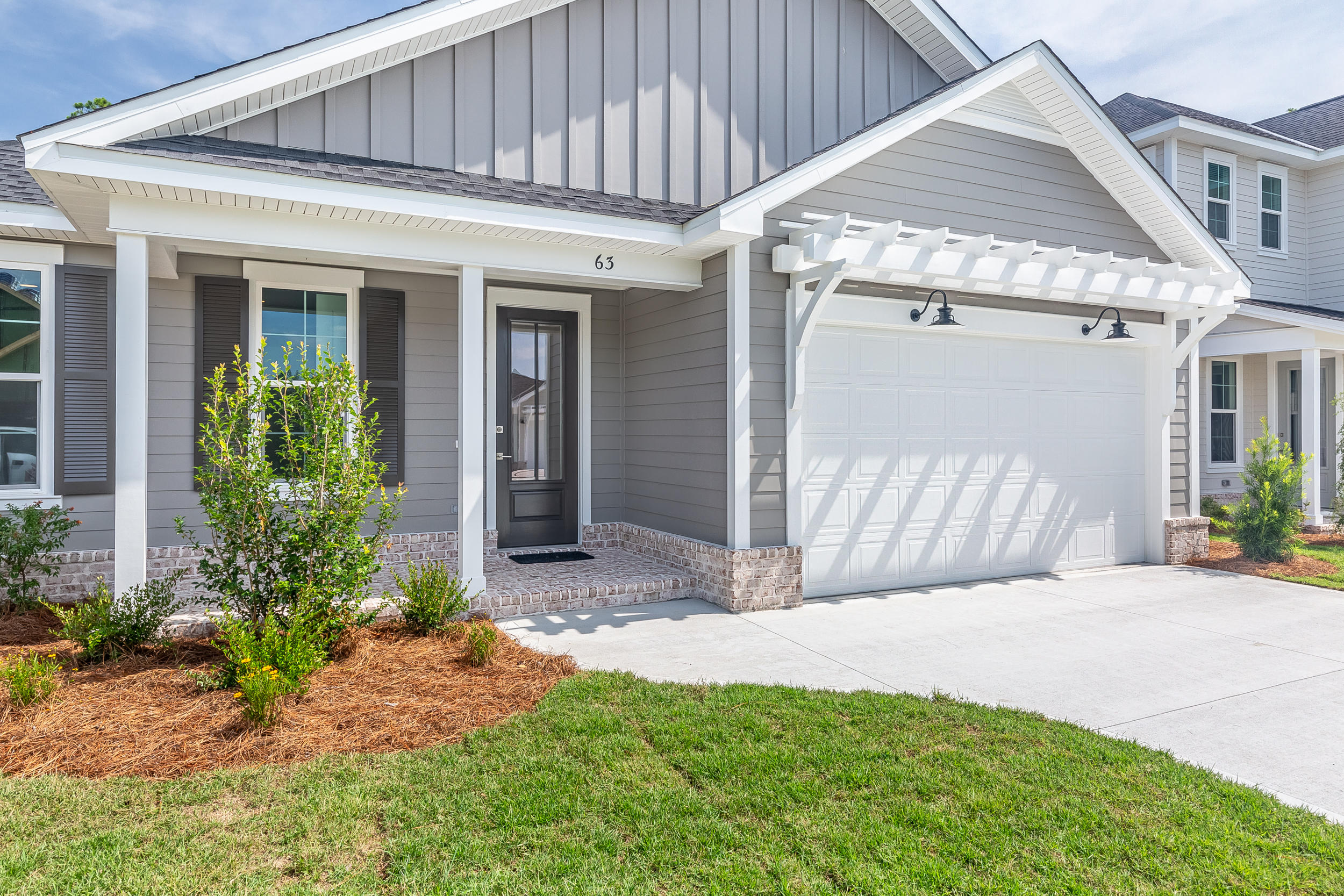 Introducing Stillwater, the newest neighborhood within the Watersound Origins community. The Revised Bella plan has 3 bedrooms and 2 baths with a 2 car garage. This open floor plan includes 9' ceilings throughout, quartz kitchen and bathroom countertops, stainless steel appliances, wood cabinetry with soft-close features, crown molding in areas, and Luxury Vinyl Flooring throughout. Notable exterior features include heirloom brick, irrigation system and a large screened in back porch for entertaining.The Watersound Origins community is a wonderful neighborhood full of amenities including the Village Commons pool & fitness center, miles of nature trails, dock access to Lake Powell, unlimited golf and much more.