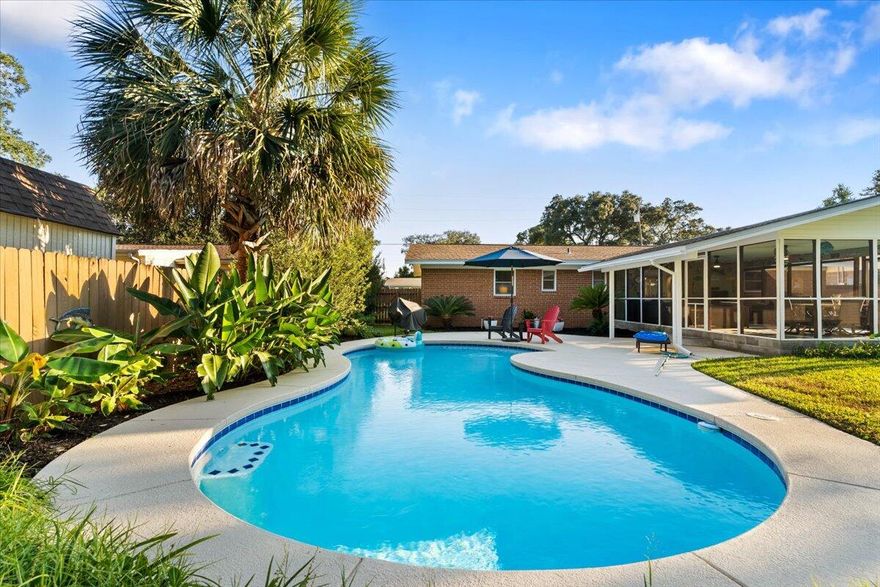 Do you believe in Love at First Sight? You will after visiting this beautiful Fort Walton Beach home, bursting with bright and colorful Florida charm! Designed for relaxed coastal living, this 3-bedroom, 2-bath retreat has been beautifully updated and lovingly maintained.Step inside to find rich wood floors that add warmth and character, paired with tile in the kitchen, baths, and halls for effortless coastal comfort. The stunning kitchen is a showpiece, featuring quartz countertops, stainless steel appliances, a glass mosaic tile backsplash, and under-cabinet lighting that makes every surface sparkle. Elegant crown molding throughout the home adds a touch of timeless style, complementing its fresh, inviting feel.Outside, the lush landscaping, complete with fruit trees, sets the s tage for your own private oasis. Take a dip in the sparkling pool, or unwind in the large screened-in lanai, perfect for entertaining or simply soaking in the tropical scenery. A spacious shed offers extra storage for all your beach and garden gear.

This home also features a new roof, full copper rewire, new water heater and 2017 HVAC, so you can move in with confidence and peace of mind.

Ideally located just minutes from Eglin Air Force Base, Hurlburt Field, and our world-famous white-sand beaches, this property perfectly captures what Florida living is all about.

Come fall in love, because this home is ready to love you back.