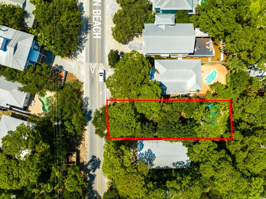 Located South of 30A, this offering is a great opportunity to build your dream home on one of the last remaining vacant lots in the historic, 'Old Florida' community of Grayton Beach. Covered with native magnolias, palmettos, and sand live oaks, this natural masterpiece is an unpainted canvas awaiting your plan for a beach dream home. Grayton Beach has been consistently ranked in the top 10 beaches in the world! This homesite is conveniently positioned within walking distance of Scenic 30A's most iconic restaurant, The Red Bar, the sugar white sand and emerald Gulf water, AND is also surrounded by Grayton State Park and Coastal Dune Lake - Western Lake. Enjoy true Florida living along stunning beaches, bike riding, fishing, boating, or boarding on Western Lake plus a convenient location n