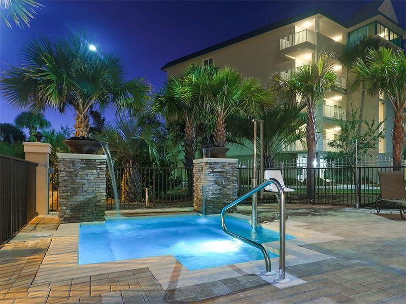 Ground floor 3BR condo just steps from beach access and pool. Features include 10 foot ceilings, granite counter-tops, wood floors throughout with tile in the bathrooms. Living room is spacious with access to the covered patio. The kitchen features nice cabinetry stainless steel appliances and breakfast bar.Master suite features double vanity, garden tub & separate shower. Alerio amenities include heated pool and hot tub, kids splash pad, grilling area and on-site office. This complex is located close to shopping, restaurants, entertainment plus the beautiful white sand beaches. Come take a look at your new beach place!!