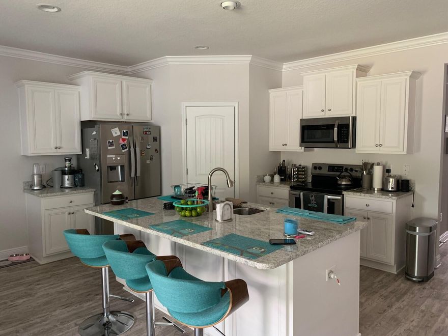 Beautiful, like new home conveniently located to Hwy 98, the beaches, and Grand Boulevard. This is a 4 BR/2BA home with a large, fenced in backyard. EVP flooring throughout. Large master suite has large soaking tub and stand alone shower. Stonegate community is a family friendly community.  One month's rent deposit is due at time of rental and will be returned based on condition of the home. Pet's will be considered, and an additional deposit might be required.