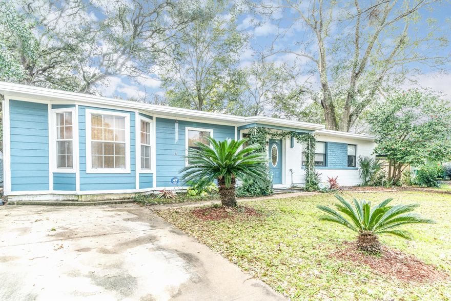 Absolutely charming! Spacious and well cared for 4 bedroom, 2 bath home in the heart of Fort Walton Beach! This home features a split floor plan with a beautiful barn door separating the additional bedrooms from the main living space. The master bedroom has an en suite bathroom and walk-in closet. The kitchen is adorable and functional! Separate utility room with pantry off the kitchen adds to the space. The large back yard features a fire pit, concrete patio, and a very cool hand water pump for accessing the well water! You really have to see this one!