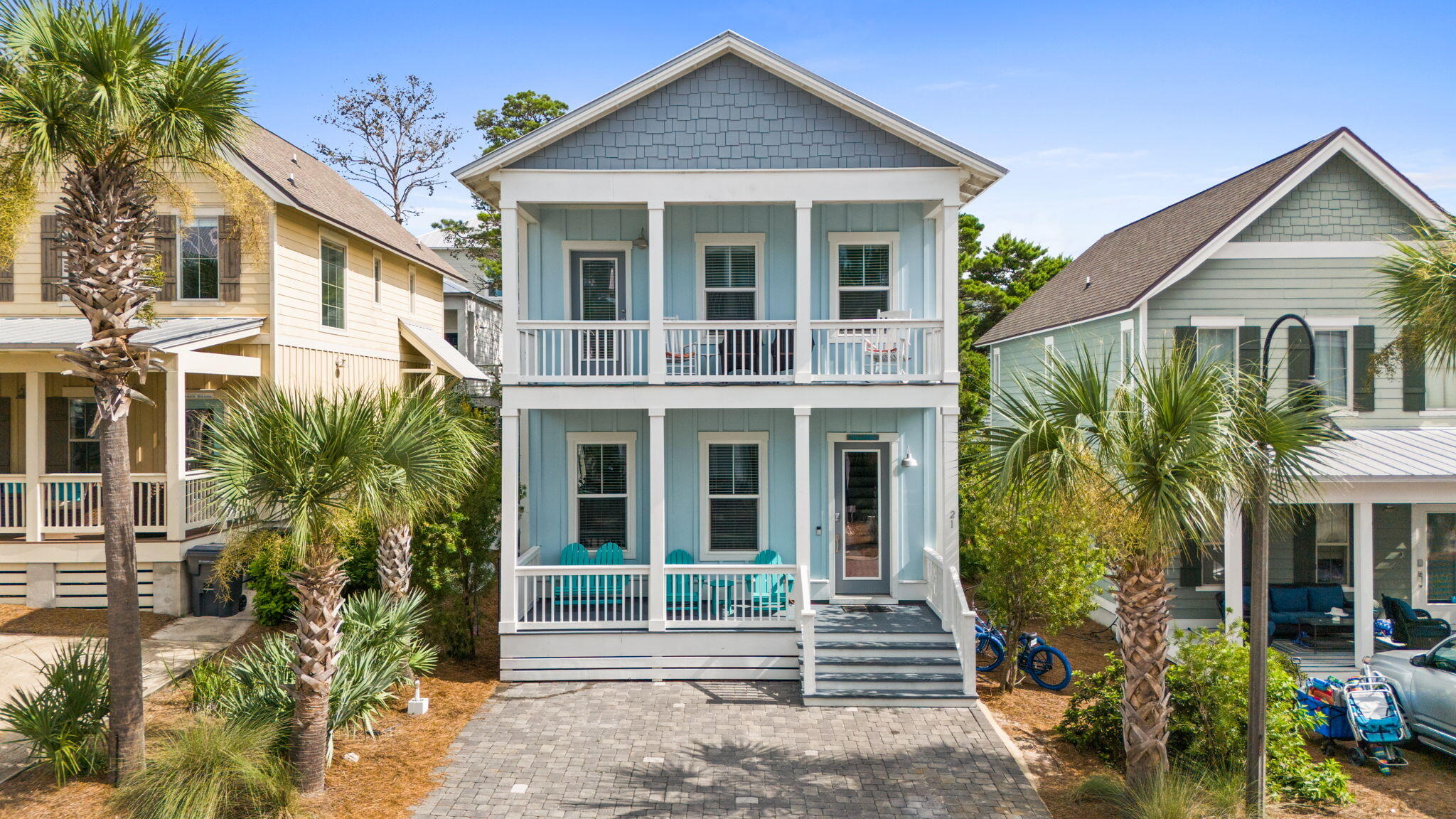 Your 30A beach retreat in a PRIME LOCATION awaits at 21 Magical Place - turn-key, thoughtfully designed, and just steps from Dune Allen Regional Beach Access (0.3 miles). Positioned on the west end of 30A behind Stinky's Fish Camp, this home is ideal for a full-time residence, second home, or short-term rental investment.The open-concept layout features high ceilings and an abundance of natural light. The kitchen is equipped with granite countertops, stainless steel appliances, breakfast bar, and dining area that flows seamlessly into the main living area. The spacious primary suite is located on the first floor and includes a double vanity and a beautifully tiled walk-in shower with rainfall shower head. Upstairs, a large bonus living area provides flexible space for relaxing or entertaining. Two additional bedrooms offer ample accommodations for guests. A second story porch provides the perfect setting to enjoy morning coffee or peaceful evening skies.
Additional highlights include a private back deck, outdoor shower, and convenient access to the community pool just 50 feet away. Gulf Place Town Center, with its popular dining, shopping, and entertainment options, is just a short drive away. Sold fully furnished and rental ready, this home combines comfort, location, and lifestyle in the heart of 30A.