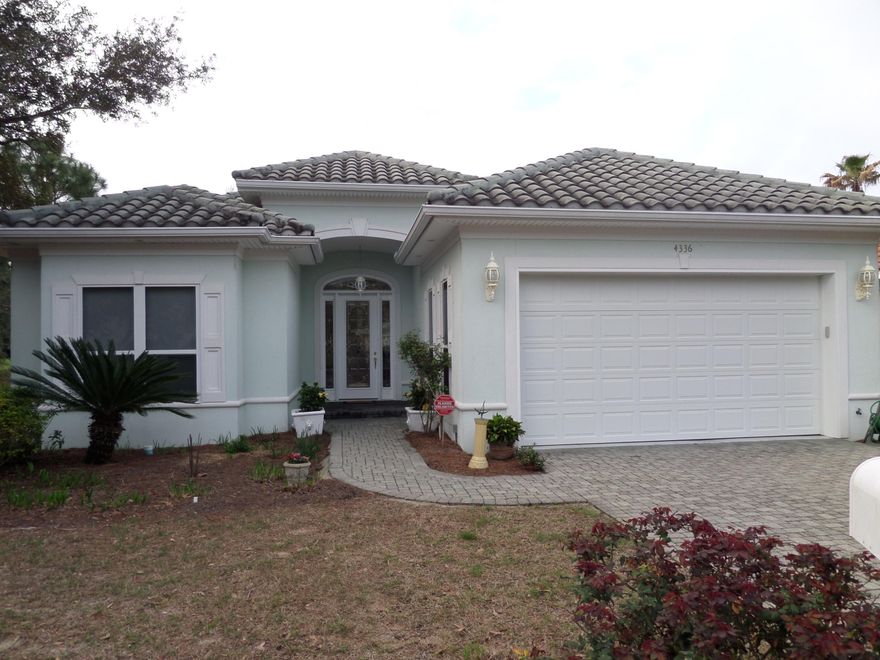 This 3 bedroom 2 1/2 Bath ranch has a Custom Open floor plan. The home is located in the private gated communityof Sunset Beach, which offers a private Club House and Pool for owner and guests. The lot is located in a cul-de-sac which overlooks the lake and 5th hole of the Bluewater Bay Marsh golf course. A few of the interior features include 12 ft ceilings with Crown Molding and an updated kitchen with granite countertops and Stainless Steel Appliances, including a 4 Burner Gas Stove. Master bedroom has a trey ceiling and 2 walk-in closets. There are 3 gas Fireplaces located in the living room, 3rd Bedroom/Den, and the large screen Enclosed Patio which opens from the house for family gatherings and entertainment.Seller is offering a Home Warranty