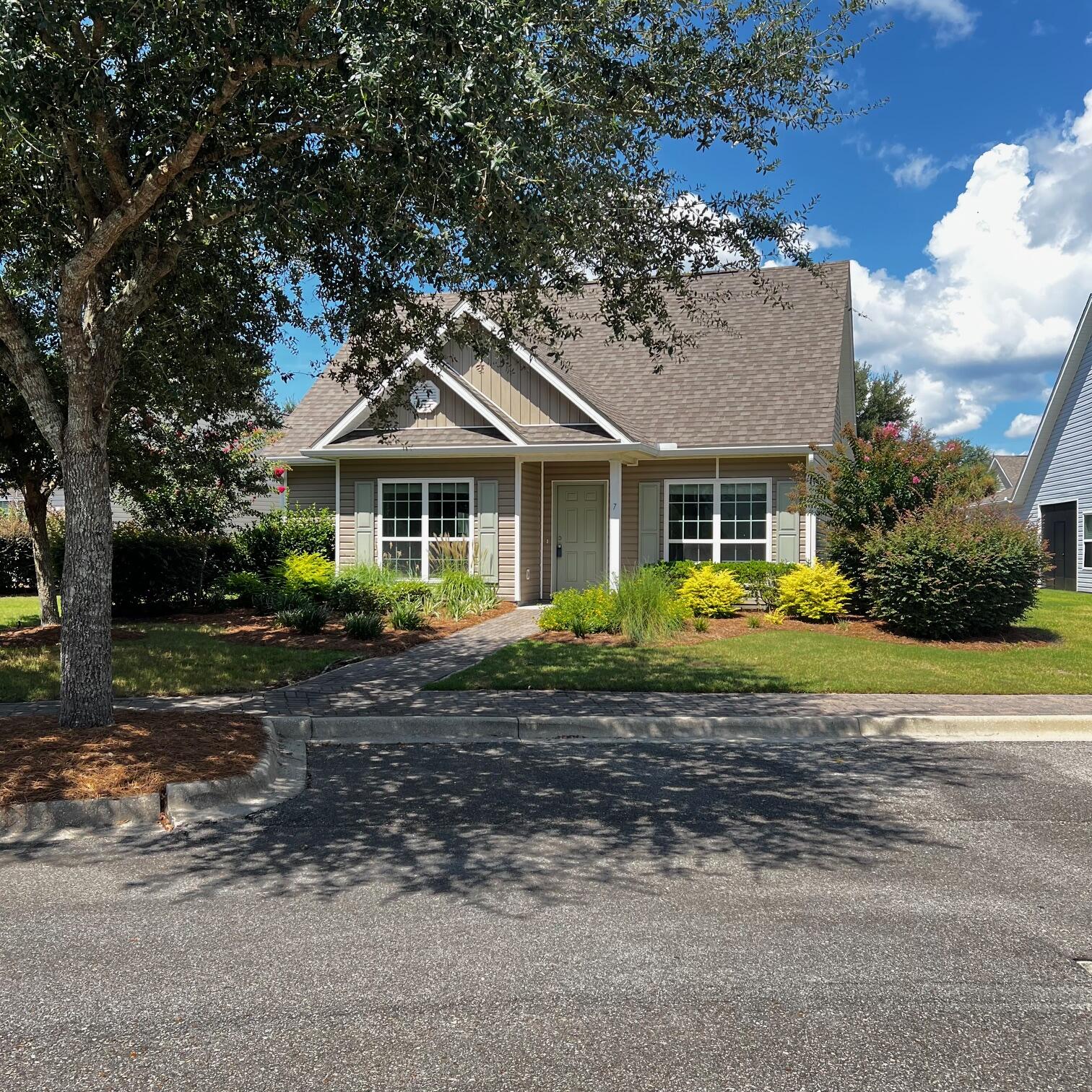 Professional photos to follow. Excellent upgrades in Kenmore Elite Gas Cooktop and Oven. and gas water heater. No carpet, matching laminate flooring throughout. Interior and Garage painted in July 2025. Owner added lots of landscape for interest and privacy, along with back patio. This is a corner lot with pleasant views from all areas of the house and an extra long drive way which is alley located. 5 minute walk to gym, tennis, three huge pools, pickle ball and more! Hammock Bay is known for great amenities which includes a middle school, general store, restaurant/brewery, plus event lawn with gazebo and huge movie screen, plus weekend farmers market. Even a dental office. Buyer is responsible for verifying all material facts of listed property