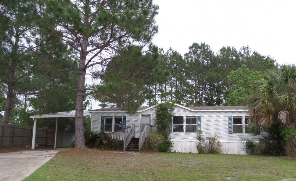 3/2 mobile home in a well kept MH community on the South side of Hwy 98. This home could make a nice rental or 2nd home. Perfectly located just a short distance from the beach. All offers must be entered as auction offers at www.genesisauctions.com Buyer and buyer agent must register at www.genesisauctions.com/register Contact listing agent for guide on registration, locating properties & offer entry. After auction concludes, it may take up to 7 calendar days for offer decision. Communication will be sent to bidders with results & next steps for accepted offer. Property subject to $2,000 buyer premium paid at closing. BANK OF AMERICA, NA EMPLOYEES HOUSEHOLD MEMBERS AND HTS BUSINESS PARTNERS OF THE BANK ARE PROHIBITED FROM PURCHASING THIS PROPERTY. WHETHER DIRECTLY OR INDIRECT