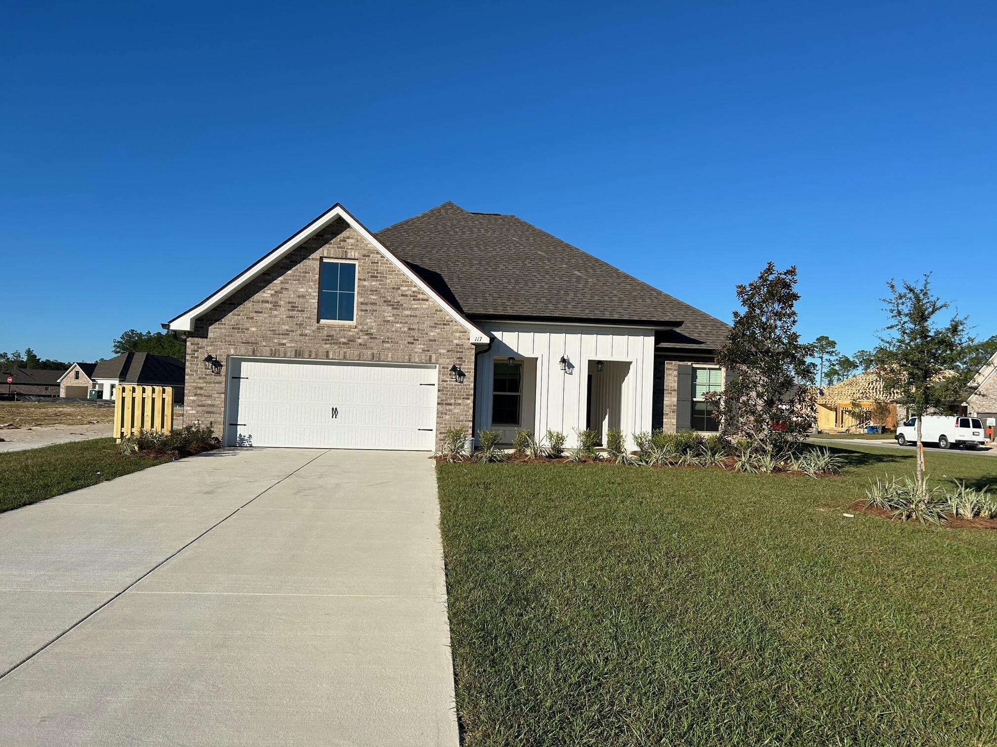 Awesome builder rate + choose TWO free: front gutters, refrigerator, smart home package, or window blinds. Restrictions apply.Located on a corner lot the HICKORY III G in Starburst at Hammock Bay community offers a 5BR, 3BA open design. Upgrades added (list attached).  Features: double vanity, garden tub, separate custom tiled shower, and walk-in closet in the master bath, formal dining room, separate den, kitchen island, walk-in pantry, covered front/rear porch, recessed lighting, crown molding, framed mirrors, smart connect Wi-Fi thermostat, smoke/carbon monoxide detectors, landscaping package, architectural 30-year shingles, flood lights, and more!Energy Efficient Features: water heater, kitchen appliance package, vinyl low E windows, & more! Energy Star Partner.