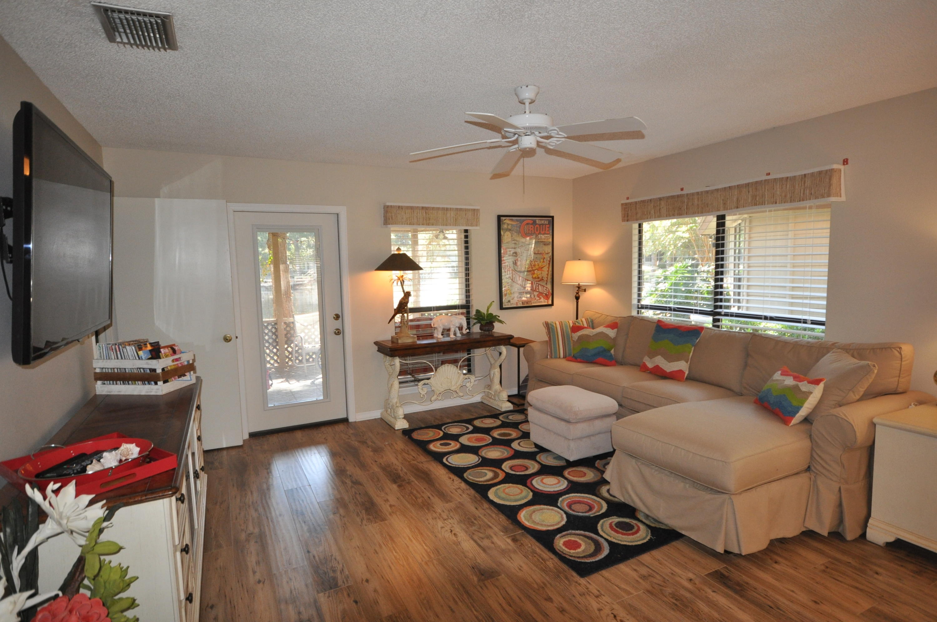 Charming, Florida cottage nestled among tall pines, mature landscaping, and the serene Eagle Lake. The interior is inviting with warm, hardwood flooring throughout the living, kitchen and dining area, granite counters, open living area floor plan with abundant windows, and a screened porch. The master bedroom offers tranquil lake views, a walk-in closet, and a private en-suite bath. Spend the day fishing or sunbathing on your private deck located directly over the lake. In addition, enjoy the extra storage room located at the back of the home. This cottage is located on the Bay Side of Sandestin Golf & Beach Resort, near the brand new Sandestin Executive Health & Wellness Center, Linkside Conference Center, Links Golf Course, and one of the Sandestin Owner's community pools.