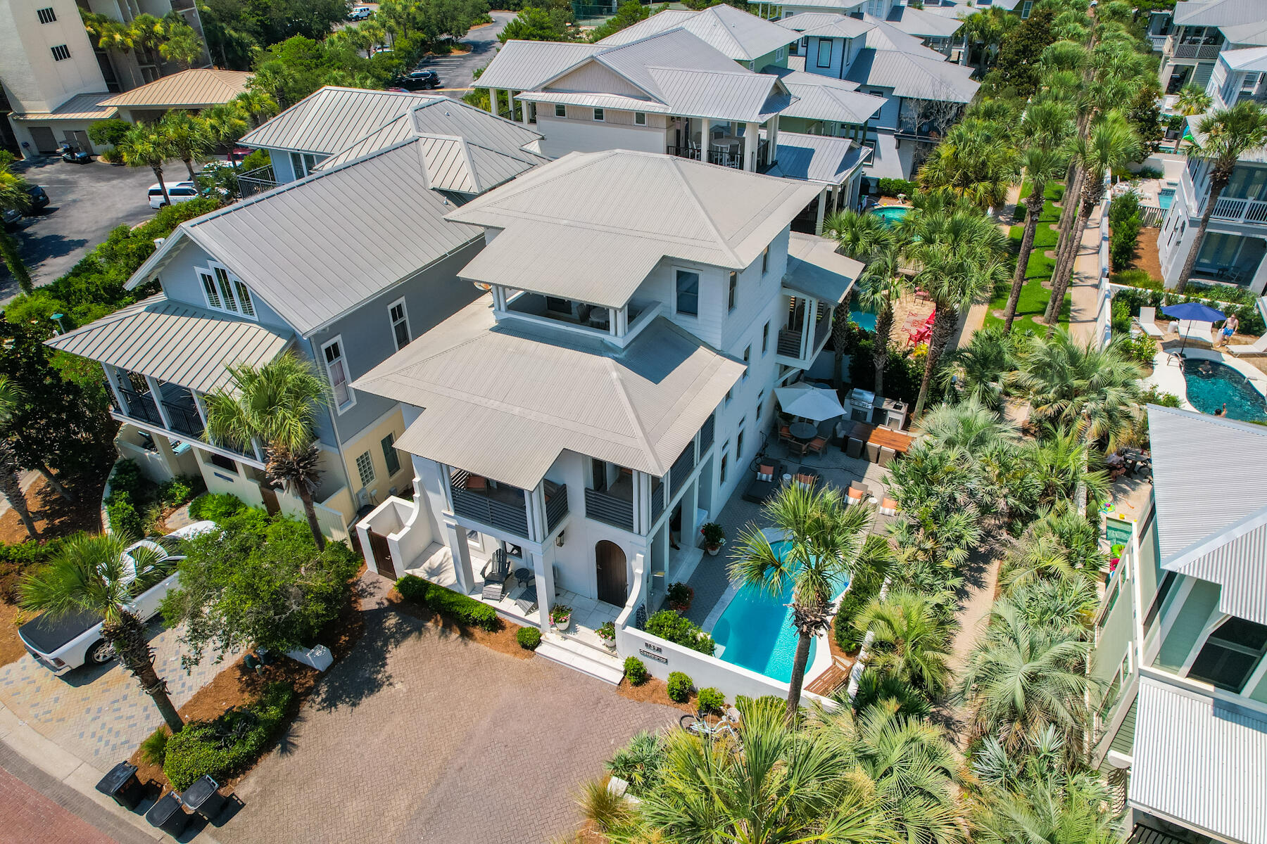 This luxurious 5 bedroom, 4 bathroom home is located just west of Rosemary Beach in Waters Edge, which is a quaint gated neighborhood south of 30A with deeded beach access.  Upon entering 139 Geoff Wilder, you will find yourself in a lovely courtyard with a private pool, lounge and dining areas and an outdoor kitchen.  Once you enter the home, you will find a welcoming living space that is open to the dining and kitchen complete with island and Viking range. The guest room on this floor has 2 full size beds and opens to the courtyard.  On the second floor, you will find the Master Suite with a covered patio ready for you to enjoy the beautiful gulf view.  A second bedroom with a king size bed and a patio over the courtyard are also on this level.  The third floor