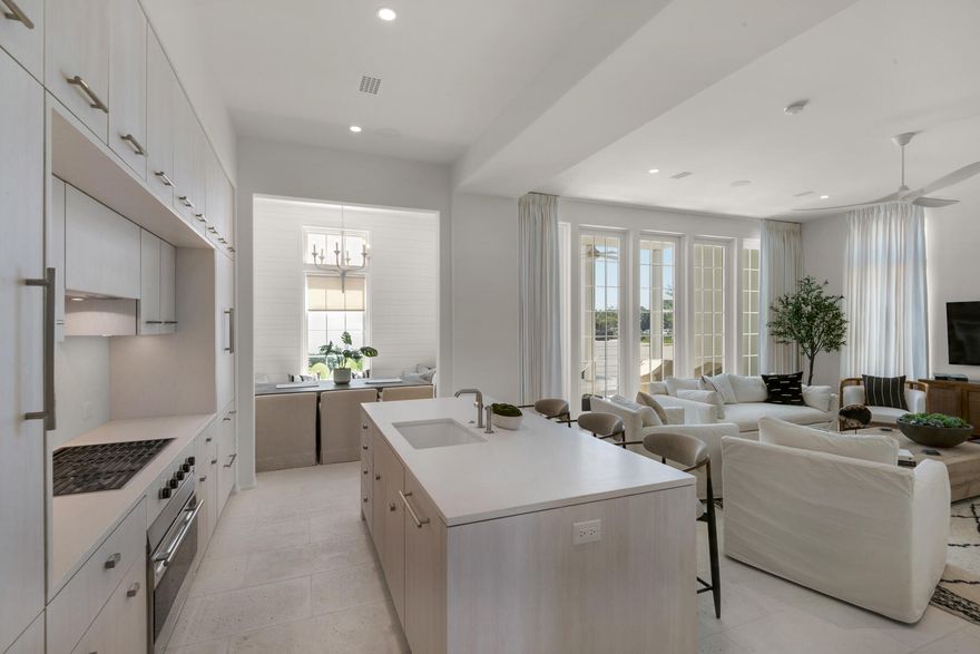 Unbelievable 3 Bedroom 3.5 Bath townhouse residence on the most exclusive end of 30A.  Bordering Alys Beach and walking distance to Rosemary Beach, this townhouse is located in the newest and most exclusive development on 30A at the corner of S. Watersound Parkway and Highway 30A. Designed by renowned Khoury Voigt architects and developed by Romair,  no detail was overlooked. The stately palms and cobble stone roadways greet you as you approach the town center's fountains and become immersed in white Grecian stucco structures in this tranquil community. Being an end unit, this gorgeous space has more windows than the interior townhomes, which means there is tons of additional natural light to the 2,496 sq ft of interior living space. There is also almost 900 sq ft of covered outdoor terraces, and an over-sized 2 car garage.   The designer upgrades on this property include: bianca carrera marble bathrooms, Caesarstone countertops in the kitchen, Subzero and Wolf appliances, Waterworks kitchen and bath plumbing fixtures, concrete pavers, and stained white oak flooring.  First floor is very spacious and open with chef's kitchen and beautiful center island with ample storage and separate dining alcove.  The second floor includes the Master suite with private balcony and 2 additional bedrooms both with en-suite baths.  The townhomes enjoy exclusive use of a community pool and cabanas that are just steps off the front porch.  The architectural elements within this new development are above anything else on 30A.  This unit is being sold fully furnished and ready for permanent living or vacation rentals.  Owners and guests will enjoy a private beach access in addition to nearby world class shopping, dining and entertainment.