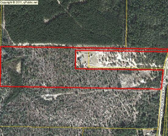 30.41 acres on Kidd Road, private, has old pond site and creek on the back of property, pine and hardwood trees, a 25x25' metal barn with cement floor built in 2006, power already run to property with two power pole connections, has Argyle water system tap in place, fabulous gravel road for entrance. Survey is available. Hunter's delight with plenty of deer, turkeys, and other wildlife. This is an excellent home site OR spot to make a hunting camp and use a travel trailer for a weekend ''get away''. Seller ask that you please do not go on property without an appointment, Call Realtor to show property, there are two locked gates. .