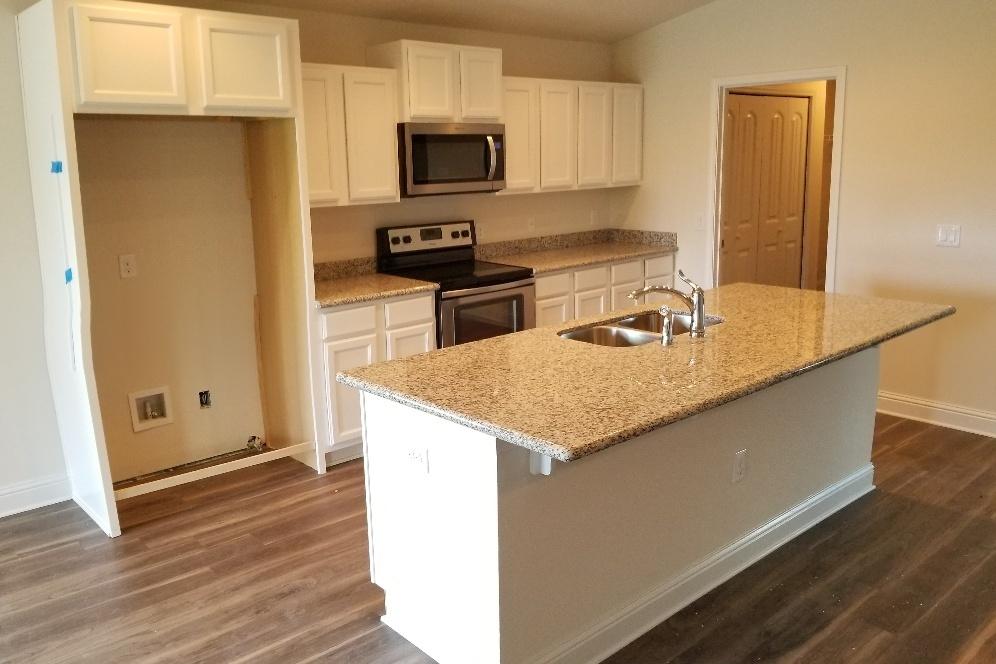 Heather's Place is the newest master plan community offered by Henry Homes. This beautiful cottage style, ranch home community features fully sodded yards, sidewalks, underground utilities, public water and sewer, convenient access to shopping and schools and only 8.5 miles to Navarre beach! Every home comes included with GRANITE COUNTER TOPS tops in the kitchen and bathrooms with under mount sinks, STAINLESS STEEL APPLIANCES in the kitchen, UPGRADED FLOORING in the common and wet areas and carpet in the bedrooms. Separate TILE SHOWER in the master bathroom (in most plans), covered back porches and much more. These homes are extremely energy efficient and all come included with our 1-year builder warranty. Take advantage of our $500 move in special with use of one of our preferred lenders!