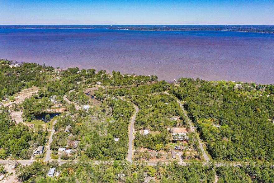 *Entered For Comp Purposes Only* Have You Been Looking For The Perfect Homesite To Build Your New Home? You'll Love This Half Acre Lot That's Nestled In Bay Pine Shores! Conveniently Located Just A Short Walk Or Bike Ride Away From The Choctawhatchee Bay & Only Minutes From The Highly Sought After 30a! Call Today & Make Arrangements To See For Yourself All That This Amazing Home Site Has To Offer. As Always, Buyer to Verify All Items Deemed Important.