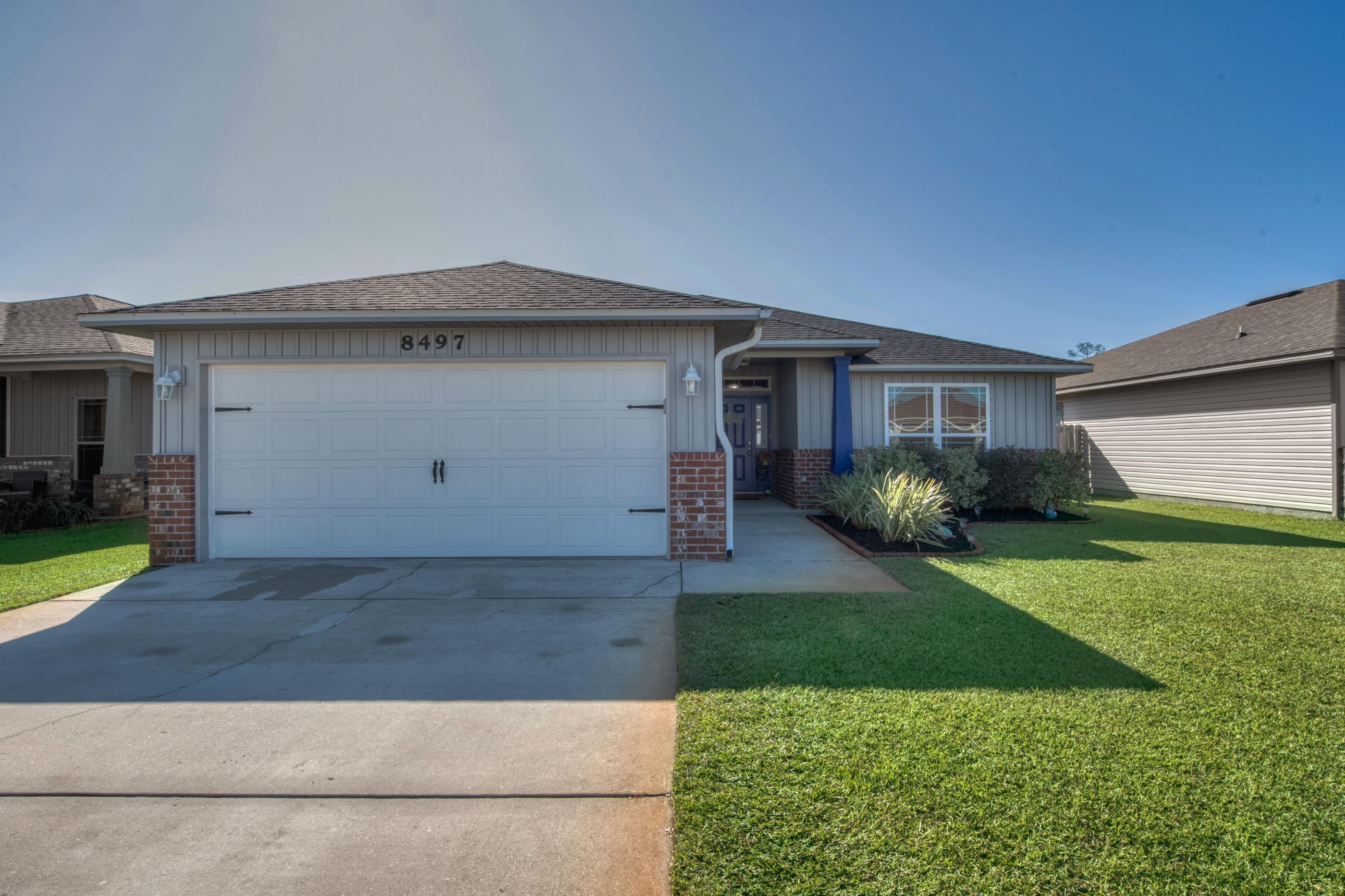 YOUR SEARCH ENDS HERE! In the desirable Duncan Ridge neighborhood in East Navarre you'll find 72 homes, less than 5 years old, in a community with side walks & underground utilities! This lovely home features over 1700 sqft, with 4 bedrooms & 2 bathrooms. Wide open floor plan with high ceilings. BRAND NEW luxury vinyl plank flooring throughout the living area, kitchen, dining & bathrooms. Granite counter tops throughout the home as well as a backsplash & stainless appliances in the kitchen. If that wasn't enough, the property comes with a 3D/HD movie projector, screen and home entertainment system. Outside you will find a covered porch where you can sit & enjoy the views of your peaceful and perfectly manicured, fenced backyard. Irrigation system also installed! Schedule your showing today