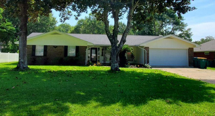 This property will give you the chance to live in one of Fort Waltons most highly desired areas. Homes in the Tanglewood/Overbrook area have been sought after for many years. The location of this home provides peace, privacy, and the security of a neighborhood that still look out for one another. The home itself offers 3 bedrooms, 2 full baths and a bonus mud room with a separate entrance, shower, sink, and toilet! The kitchen is quaintly modern with stainless steel appliances and a mini fridge to store extra drinks.You will have peace of mind knowing the roof and A/C were both replaced in 2017 and the sellers are offering a home warranty. Like new carpet in the bedrooms and newer vinyl plank throughout the home provides durability. Once out back you'll find a nice sized yard with vinyl fencing and a 240 sq ft storage shed. Store your lawn equipment here and your toys in the 2 car garage.