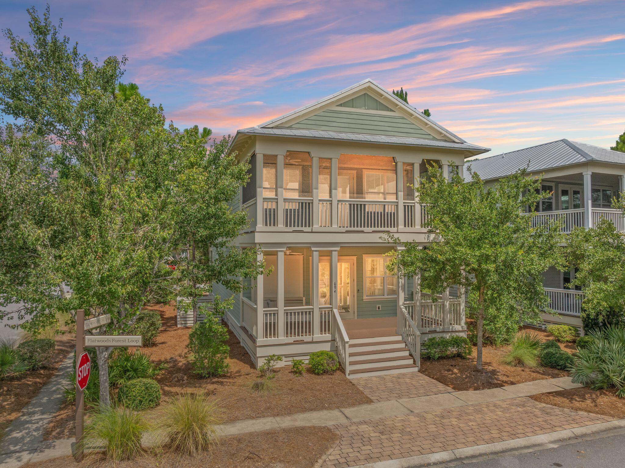 Welcome to 694 Flatwoods Forest Loop, a stunning 4-bedroom, 3.5-bath home ideally situated on a spacious corner lot in the sought-after NatureWalk at Seagrove community -- just off 30A. This property has never been rented and is in exceptional condition, offering a pristine coastal retreat with an unbeatable location just steps from the community pool, pickleball courts, and basketball court. Inside, natural light fills the open-concept living spaces, complemented by warm pine floors and timeless finishes. The kitchen features stainless steel appliances, a built-out pantry with generous storage, and plenty of counter space for entertaining.
With two primary suite options one on the main level and another upstairs the home offers flexibility for guests or multi-generational living. Upstairs also includes a versatile living area perfect for a media room, playroom, or lounge, plus a guest bedroom featuring newly built custom full-over-full bunk beds.
Three expansive porches invite you to unwind, with two featuring oversized bed swings ideal for relaxing after a day at the beach. Just off the rear porch, you'll find a bonus room perfectly suited for a workout space, small office, hobby room, or quiet retreat. Additional highlights include a whole-home generator and a 6-seater golf cart, perfect for cruising to the beach or exploring the neighborhood.
NatureWalk at Seagrove offers exceptional amenities, including three resort-style pools, pickleball and basketball courts, playground, and scenic walking trails throughout the neighborhood and forest.
Whether you're seeking a permanent residence, vacation home, or investment opportunity, this property delivers the perfect blend of comfort, style, and location.