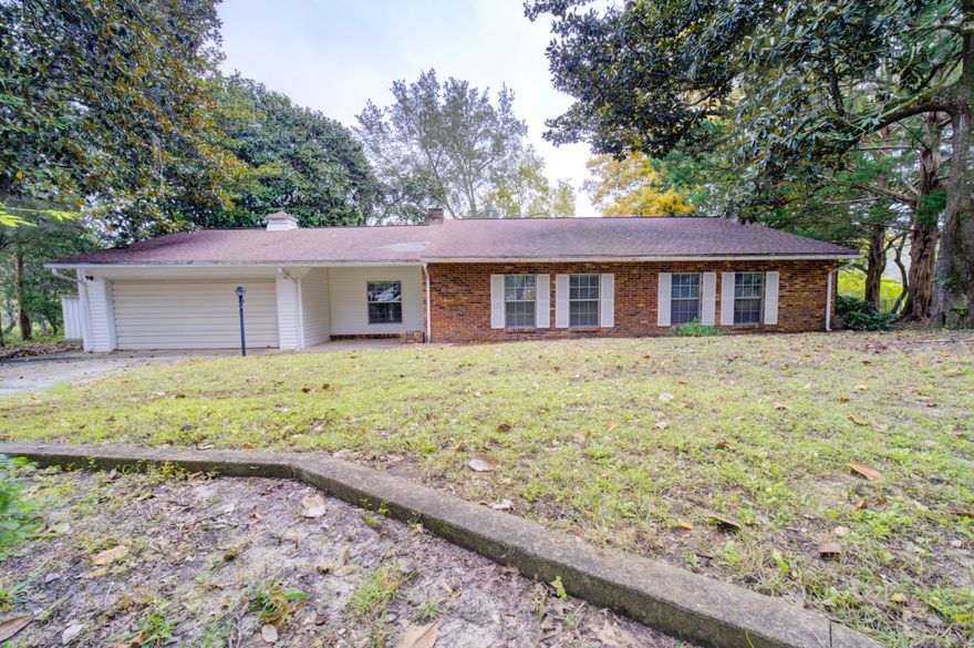 MOTIVATED SELLER! $25,000 PRICE REDUCTION! BRING ALL OFFERS! Seller now offering a $15,000 concession for complete roof replacement (to be completed before closing), in ADDITION to $5,000 cash back at closing, that you can use for remodeling upgrades or a new dock! WATERFRONT home sits on approximately 1 acre a stone's throw from the bay in Choctaw Beach, with over 300 feet of private water frontage on Lake Sharon (see survey in photos). Home is located in Lake Sharon Estates, a beautiful and secluded neighborhood, only 5 miles east of the Mid-Bay Bridge, making for an easy commute to Destin and other nearby communities.The home is in need of some cosmetic upgrades -- or not if you prefer the retro! Home is solid brick with good bones. it sits, could easily be converted into a three or four bedroom home at minimal cost, or this older home could be demolished and this huge 1 acre waterfront property split into TWO .5 acre waterfront lots!

Fish from your own backyard or at the nearby boat launch with access to the bay, located only ¼ mile away! Welcome home!