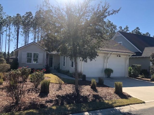 This immaculate and charming Florida cottage open floor plan design (Dahlia Plan) is a must-see for permanent and second home residents. The single story, energy efficient home was built in 2016 and is loaded with custom features: Rheem tankless hot water heater, REME HALO whole home duct air purifier, 8' doors throughout, crown molding, 3.5 and 5 inch wood trim, 9' ceilings, wainscoting in foyer/hallway, wide planked engineered hardwood floors, travertine tile, recessed lighting throughout, large walk in showers in all baths, 6' Kohler soaking tub in master-bath, roomy closets with shelving throughout, 4th bedroom currently used as an office, wired for surround sound, custom window treatment/blinds, hurricane proof windows/doors.
