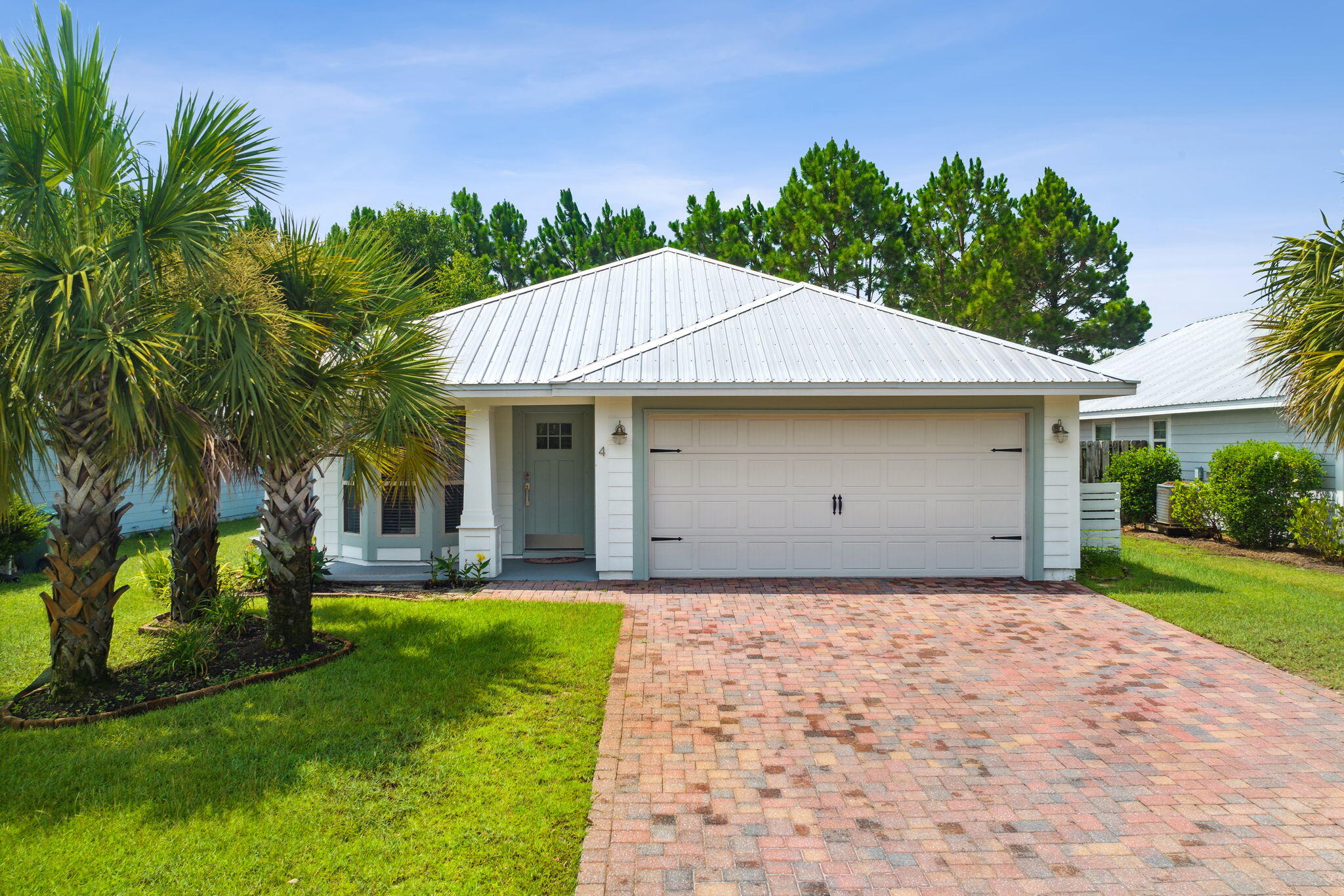 Introducing 4 Bald Eagle Dr., a charming house nestled in the sought-after location of Santa Rosa Beach, FL. This delightful home offers a comfortable and spacious living experience with its three bedrooms and two bathrooms. The open floor plan creates a seamless flow throughout the house, providing a warm and inviting atmosphere. The kitchen is equipped with upgraded cafe refrigerator and whirlpool stainless appliances, perfect for preparing delicious meals and entertaining guests. Step outside and enjoy a refreshing oasis on the pond where you can relax and unwind on those sunny Florida days. The entire home has been freshly painted, new carpet, new appliances and new quartz countertops throughout.