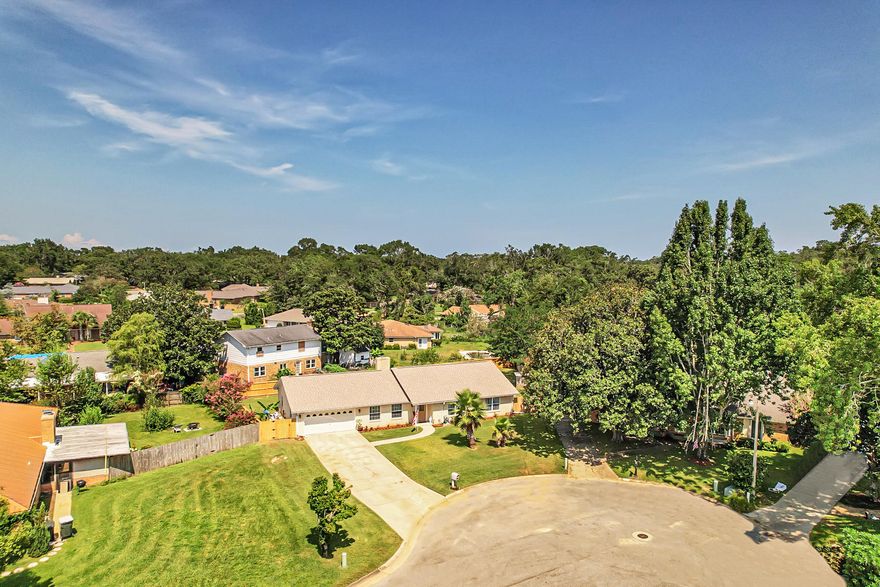 MOVE IN READY! Completely remodeled 4 bed/2 bath in Lake Charlene. New in 2021 are both bathrooms, kitchen, front and back doors, luxury vinyl tile, carpet, fence, refrigerator, microwave and dishwasher. The new kitchen with shaker cabinets, quartz countertops, pantry and breakfast bar opens up to a dining room and large family room with wood burning fireplace. Perfect to entertain! The remodeled bathrooms have new tiled showers, quartz countertops, shaker cabinets and modern light fixtures.  This home is set on a quiet culdesac with a large fenced in yard with room for a pool!  Bonus features include his and her closets, a separate living room for entertaining, ceiling fans throughout and a covered patio in back yard. Roof 2020. HVAC 2017. Copper wiring 2015. Water heater 2015.