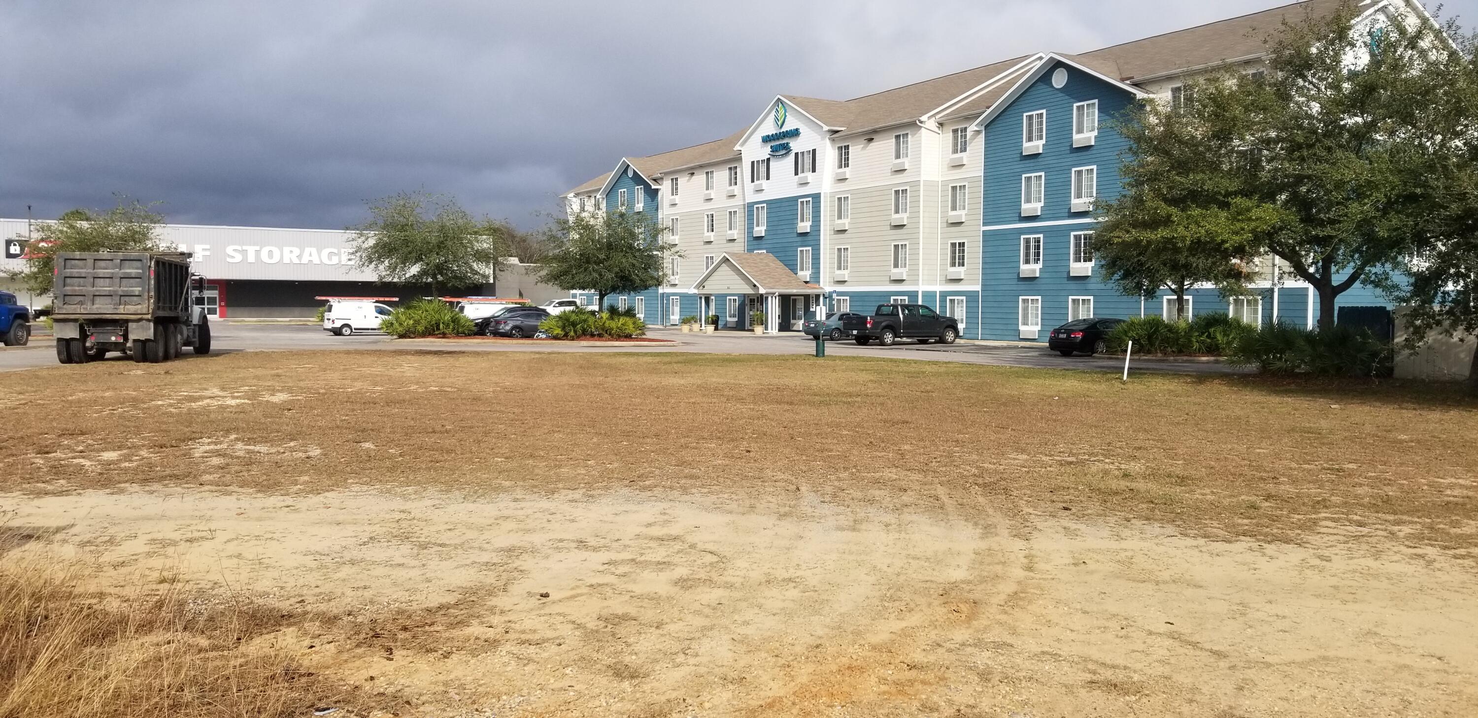 Excellent Visibility with access to Racetrack Rd, Eglin Pkwy, and Harrelson Dr. Property. Some infrastructure already in place including access drives and 8 parking spaces. Located next to CVS, Woodspring Suites, and across from Publix.