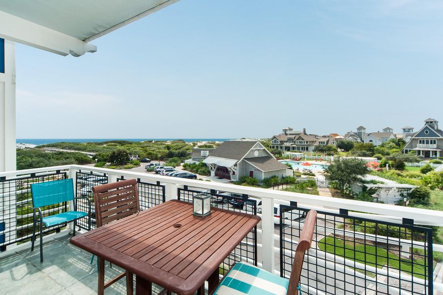 Southwestern gulf views over a breathtaking expanse of dune preservation can be appreciated from each room of this cozy, contemporary end unit condo, situated on the 3rd floor of Compass Point at WaterSound Beach. Watch the sunset with your favorite glass of wine from the covered balcony, which is accessible by the living room and the Master bedroom. Hardwood floors carry throughout the unit, emphasizing its spacious, open layout. The modern kitchen with raised panel cabinets, granite counters, and stainless steel appliances overlooks the dining and living room areas. Their arrangement is ideal for entertaining or interacting with friends and family while preparing meals during your stay at WaterSound Beach.