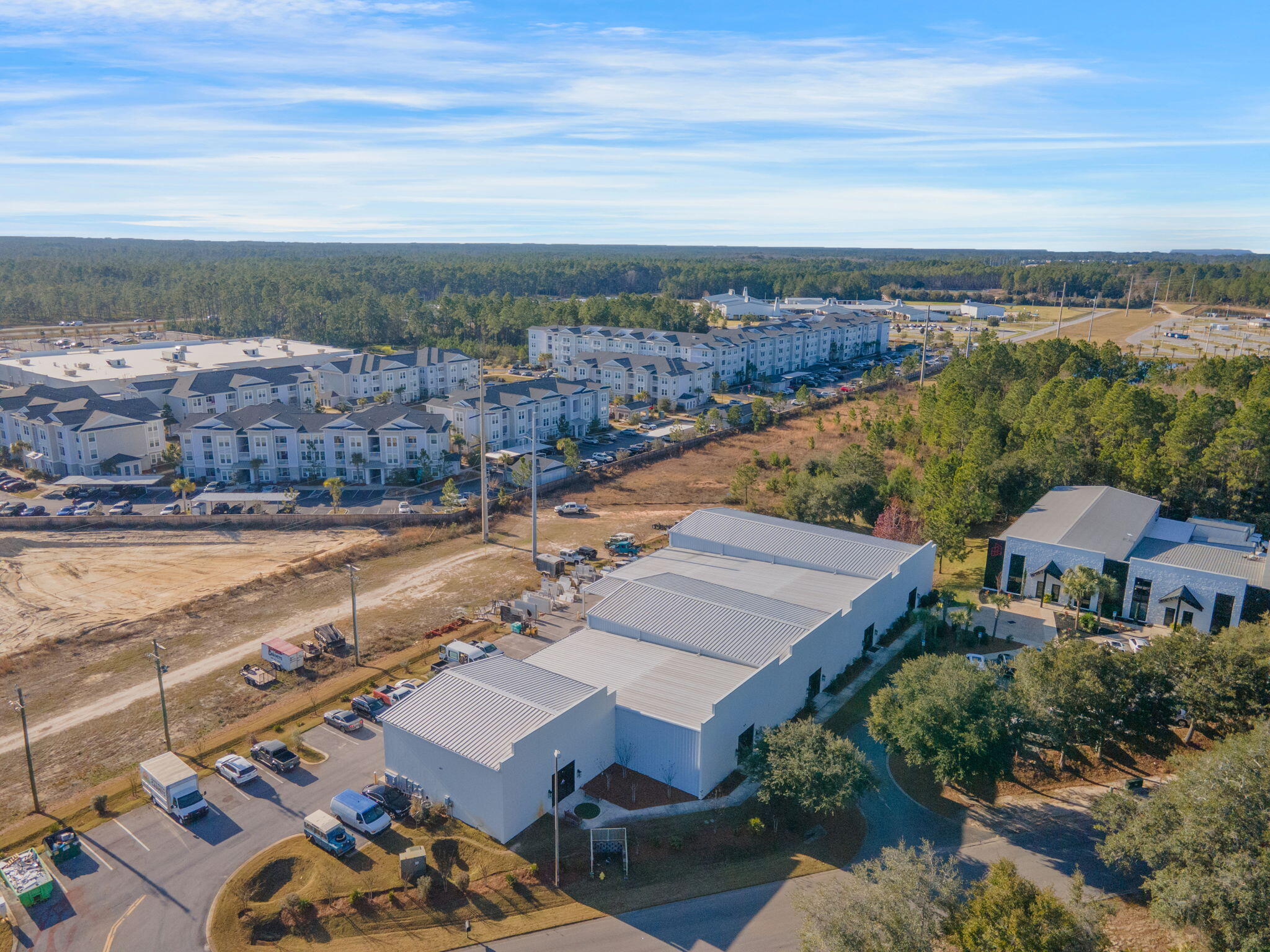 This fully leased property features approximately 20,000 SF of versatile space, including a loading dock, showroom, office, warehouse, and flex space.Situated on approximately 1.35 acres in St. Joe's South Walton Commerce Park, Serenoa is strategically located in the South Walton County market of Northwest Florida. The site offers excellent logistical access to Okaloosa, Walton, and Bay Counties. Key connections include Interstate 10, Northwest Florida Beaches International Airport (25 miles), Destin (27 miles), and Pensacola (74 miles).