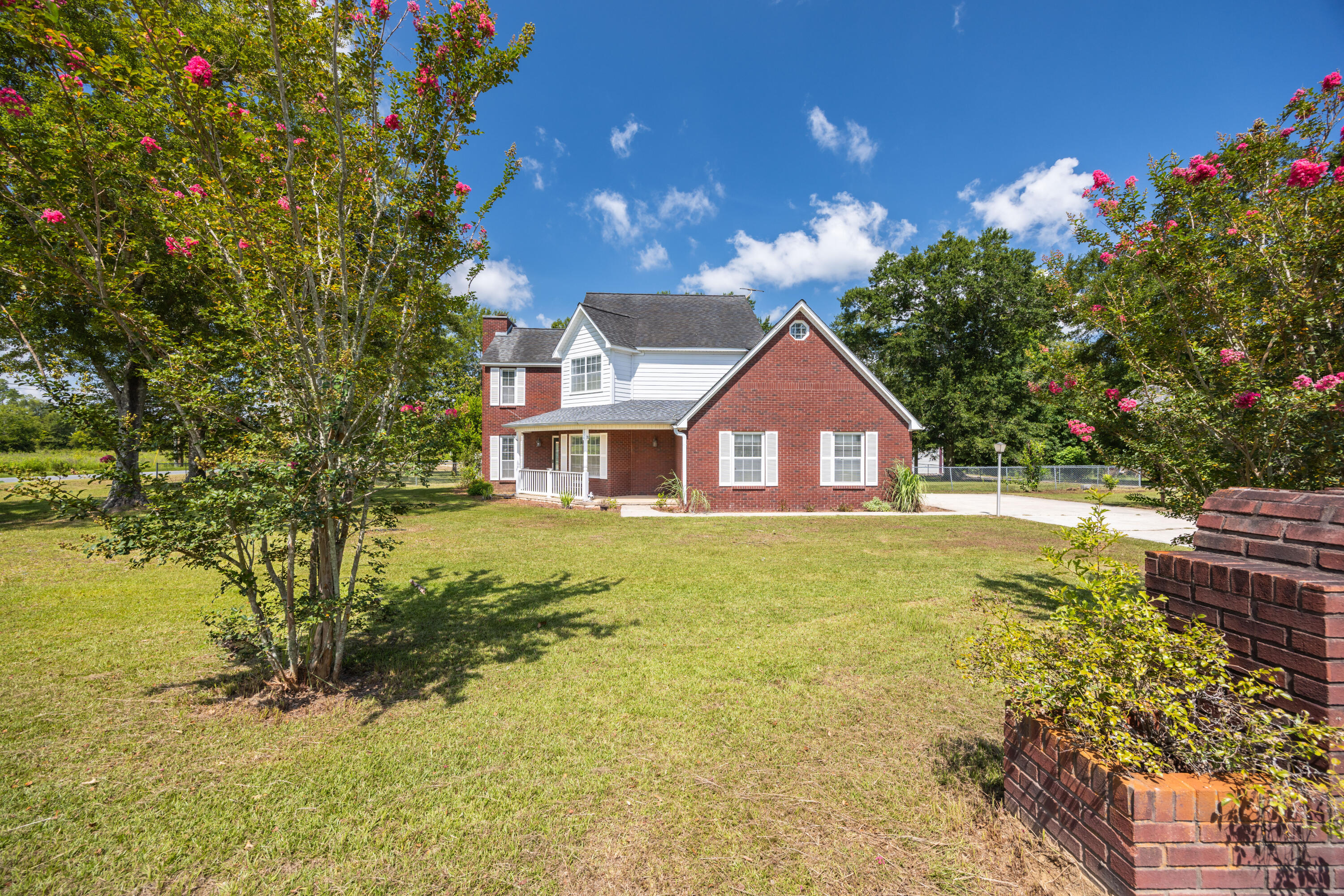 Incredible Dual Property Opportunity with POOL & Workshop - Only $399,000!!!!894 Haley Drive & 942 Brickyard Road Chipley, Florida both sit on a total of 1.38 +/- AcresMinimal Restrictions and No HOA!!!Welcome to an extraordinary chance to own TWO properties in the heart of Chipley! This rare package includes a beautifully 2,389 sq ft brick home with a saltwater pool and a massive two-story workshop, all for just $399,000!894 Haley Drive 3BR/3BA * 2,389 SQ FT * Pool * GarageStep inside this spacious two-story brick home, thoughtfully built in 1989 and freshly painted throughout. The layout offers both functionality and comfort, featuring:-3 generously sized bedrooms including a large primary suite with private balcony overlooking the pool-3 full bathrooms -Formal dining room, cozy living room with wood-burning fireplace, and open kitchen with breakfast bar
-Granite countertops, solid wood cabinetry, and wine cooler
-Engineered wood and carpet flooring, modern ceiling fans, and abundant natural light
-Spacious garage and dedicated utility room
Outdoors, enjoy the beautiful in-ground saltwater pool, new pool liner and filter system (low-maintenance and cost-saving!), and new pool shed for equipment storage. The covered patio is perfect for entertaining or relaxing on warm summer days.
The home is nestled on a fully fenced and landscaped corner lot, complete with mature and fruit-producing trees.
942 Brickyard Road-HUGE Two-Story Professional Workshop
Adjacent to the main home, this impressive structure is perfect for hobbyists, entrepreneurs, or those needing serious storage. Formerly a printing shop, this heated and cooled workshop features:
-Dedicated office space, kitchen area, and multiple work zones on the main floor
-Upstairs storage, with additional covered work bays
-Hydraulic car lift
-Two separate driveways-one paved, one gravel
-Roll-up doors and open bays for easy access
-Is on a separate meter
Location Perks:
Located just minutes from town with easy access to shopping, schools, churches, and medical care, this property offers the perfect mix of privacy, space, and convenience.
Don't Miss This Rare Find!
Whether you're looking for a multi-functional homestead, investment property, or space to live and run a business - this combo deal delivers exceptional value. Schedule your tour today!