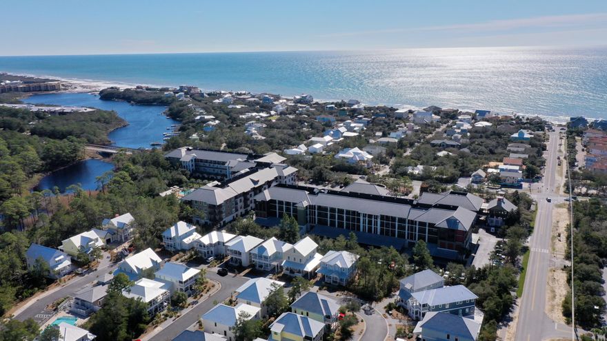 This fantastic unit is located in Redfish Village along popular 30A! The combined kitchen, living, and dining area is open and inviting with french doors leading to the balcony that overlooks the Redfish community. The kitchen features a large island and breakfast bar, granite countertops, and stainless appliances. The master suite is spacious and also has balcony access. The master bath features a tub, separate shower, and double sinks. The large guest suites are located near the entrance, each with its own attached bath. A bunk nook is tucked off the hallway and sleeps four. Redfish Village is a great community with fabulous amenities including a large pool, spa, playground, grilling area, lake and dock, private gated beach access, retail, and dining! 2021 rental projections up to 57k!