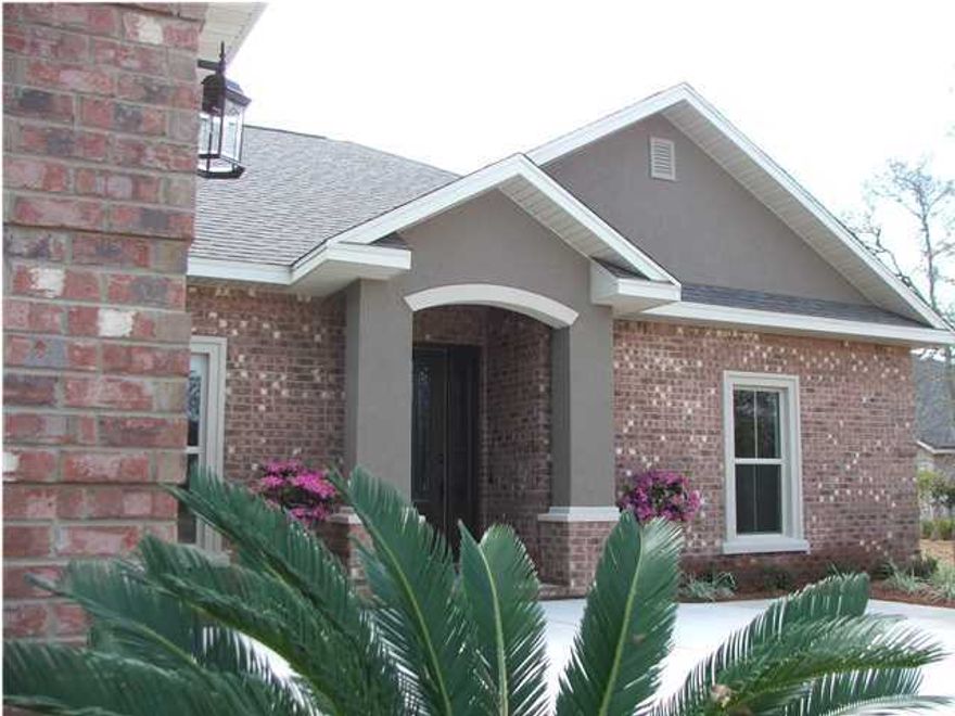 Located in the Beautiful Gated community of Chanan Estates. This stunning home is a prior year Parade of homes award winner. This gorgeous 4 bedroom 2 1/2 bath provides everything you need for your family.The custom Hardwood floors in the foyer, dining, family room and hall way will take your breath away! Tile in the kitchen and bathrooms! (Allergy Friendly.)9',10',& 11 ' ceilings. The split floor plan provides privacy for all the family members and yet brings the whole family together with the huge 20x18 great room. Gather the family around for family night and light up the gas fireplace for those chilly winter nights.The large fourth bedroom could double as an office or nursery.