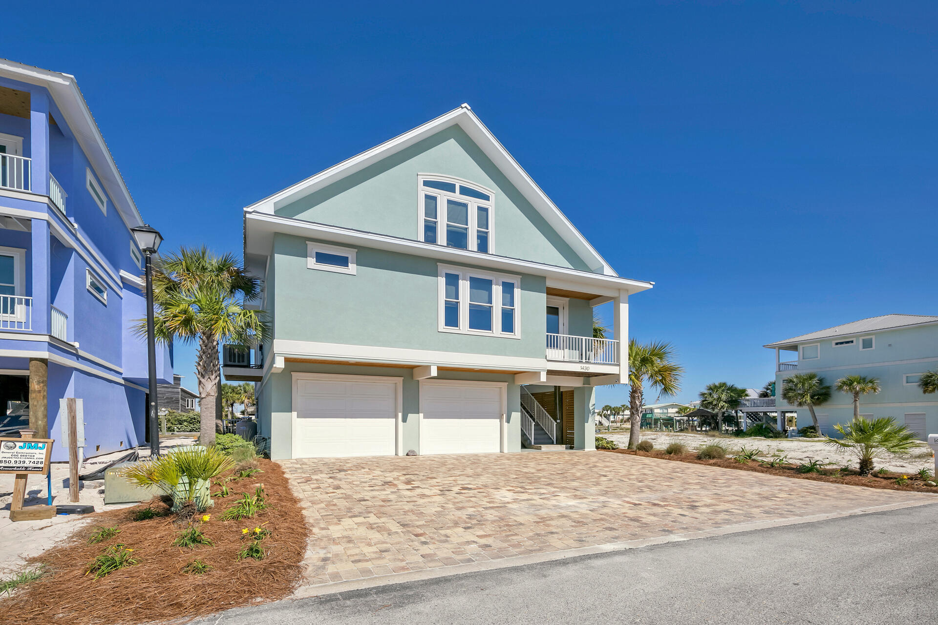 Gorgeous custom designed and quality built canal front home on Navarre Beach. Open and bright 4 bedroom 3 1/2 bath or 3 bedroom and an extra family room on second level. Two master suites, one on each floor. Open kitchen, living room and dining room with beautiful views of the canal, sound and sunrises. The kitchen has white shaker cabinets, marble countertops and an enormous pantry that would make a great owners closet. Main floor master and laundry room. Master bath has separate sinks and separate his and her walk in closets. Upstairs are two bedrooms and a large family room or could be a bunk room. 12 foot ceilings, 7' crown molding, bullnose sheetrock, luxury vinyl plank flooring and custom seagrass window coverings add to the elegance of this home.