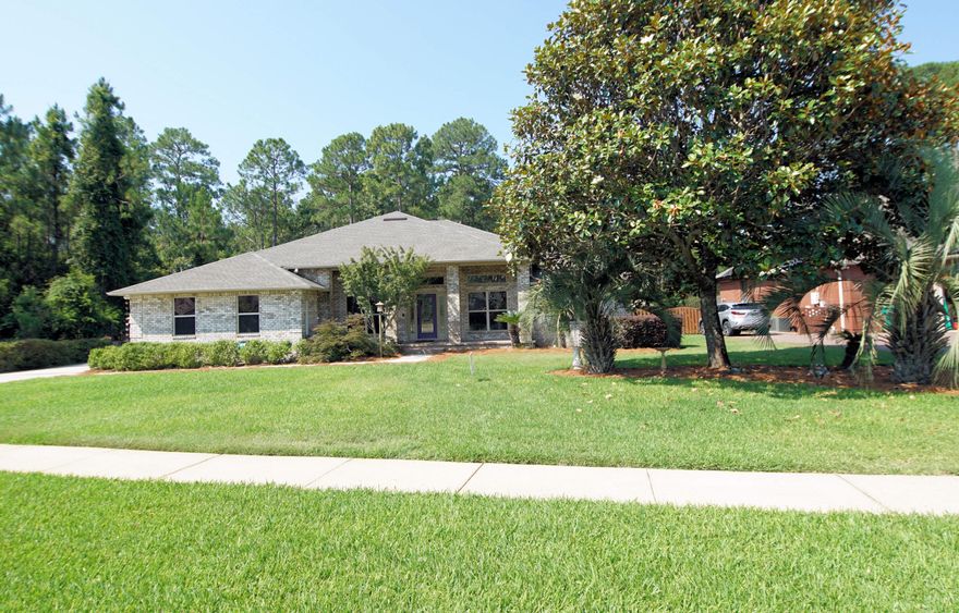 This home is situated in one of the most sought-after subdivisions offering the convenience of an HOA without the expense.  It offers a nice size lot surrounded on 2 sides by a green belt giving you the privacy that you may desire. The front porch says welcome as you pull up perfect for any break of the day reading that perfect book and a cup of your favorite beverage.  As you enter the front door the open floor plan says welcome and can accommodate any furnishes.  The separate dining room and large eat-in kitchen can accommodate any large social or Holiday feast.  There is no wasted space in this floor plan that features 4 bedrooms and 3 baths.  1 Bedroom and bath are adjacent to the back porch making it perfect for the extended stay guest who may need a little privacy.