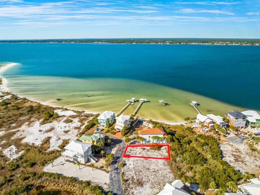 VIEWS OF SANTA ROSA SOUND! Located within the tranquil Gated Community of Caribbean Isle, this captivating property boasts a multitude of enticing features. Not only does this lot offer Calming Views of the Santa Rosa Sound but its Westward outlook overlooks County Conservation Land framing the backdrop for breathtaking Florida Sunsets. Lot 31 is truly unique in that it Backs Up to a Community Conservation Area ensuring no one can build directly behind you. This invaluable feature not only ensures privacy and tranquility but also showcases the preservation of the natural beauty of the area. Enjoy the feeling of being nestled within the embrace of nature while still being part of a thriving and sought-after community. This lot is ready for you to bring your vision of Beach Life. Caribbean Isle offers a variety of amenities for residents & guests to enjoy, including tennis courts, a gated entrance for added privacy and a sparkling community hot tub + swimming pool...it is Florida after all!((Navarre Beach is one of the last areas with an "Old Florida" appeal and a Fantastic Place to Live and Own a Piece of Paradise as either Secondary/Investment or Primary Home. Navarre Beach has Miles and Miles of White Sandy, Crowd Free Beaches, and Stunning Emerald Hued Waters. There's plenty of Leisure Activities to enjoy whether on the Gulf of Mexico or the Santa Rosa Sound, with Parks, Hiking/Biking Paths, and the Spectacular Gulf Islands National Seashore. Just over the National Seashore is Pensacola Beach for even more Entertainment, Shops, and Restaurants.