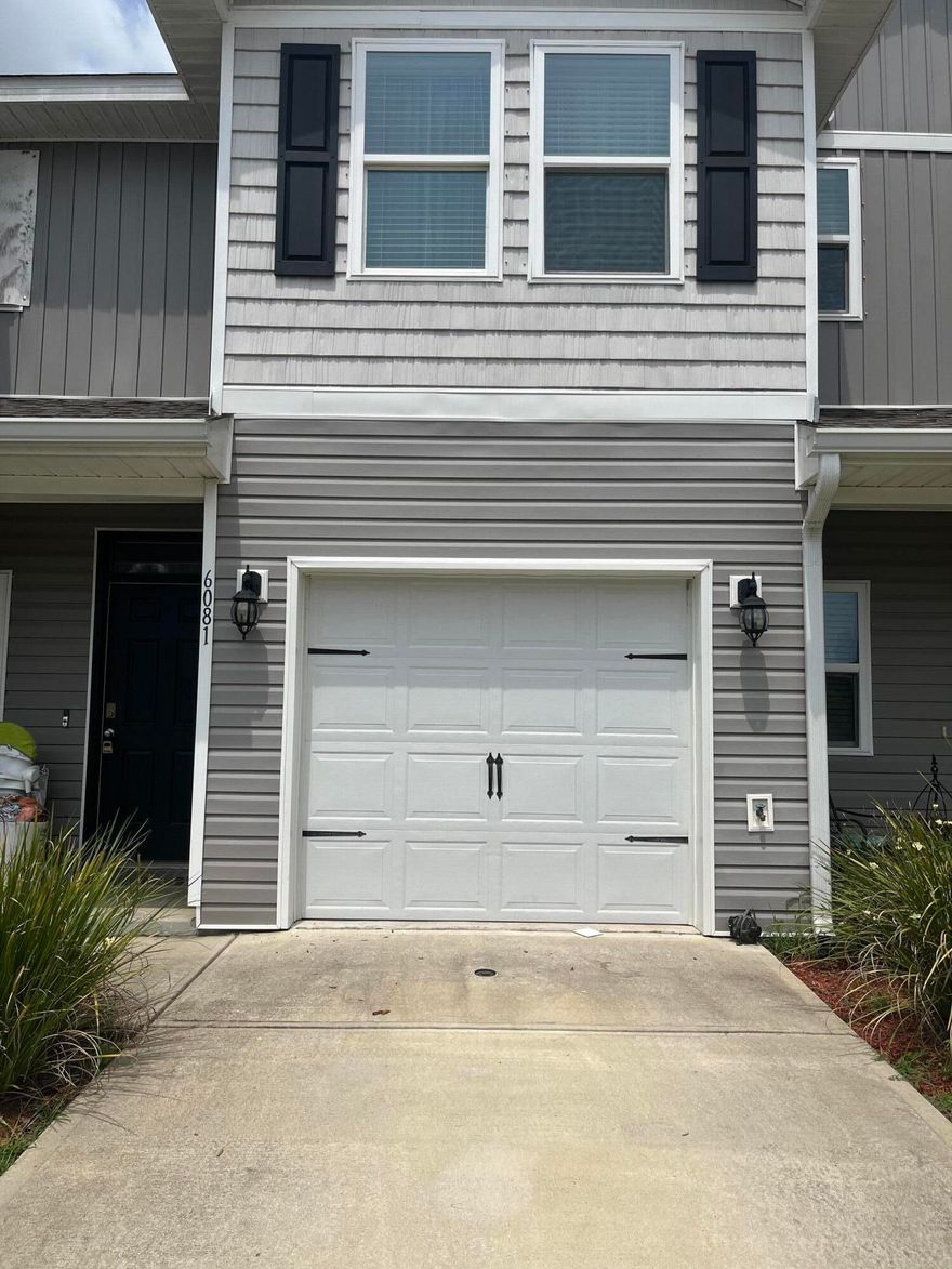 Beautiful townhome is ready for its new owner. Professional Pics coming soon. Great location minutes to NAS, main campus of Navy Federal Credit Union. Beautiful luxury rolled wood looking vinyl flooring throughout first floor. Downstairs you will find an open floor plan, with elegant nine foot ceilings. A gourmet's delight kitchen with beautiful recessed-panel maple door cabinetry with crown molding. Recessed lighting and a large pantry. A half bath and under stairs spacious storage closet. Upstairs is WW plush carpet in all bedrooms. Master bedroom with en-suite and dual vanity. The other two bedrooms share the second full bathroom. Smart home enabled Skybell Dual pane hurricane windows with hurricane protectors. Close to shopping and multiple dining options. Access to I-10 nearby.