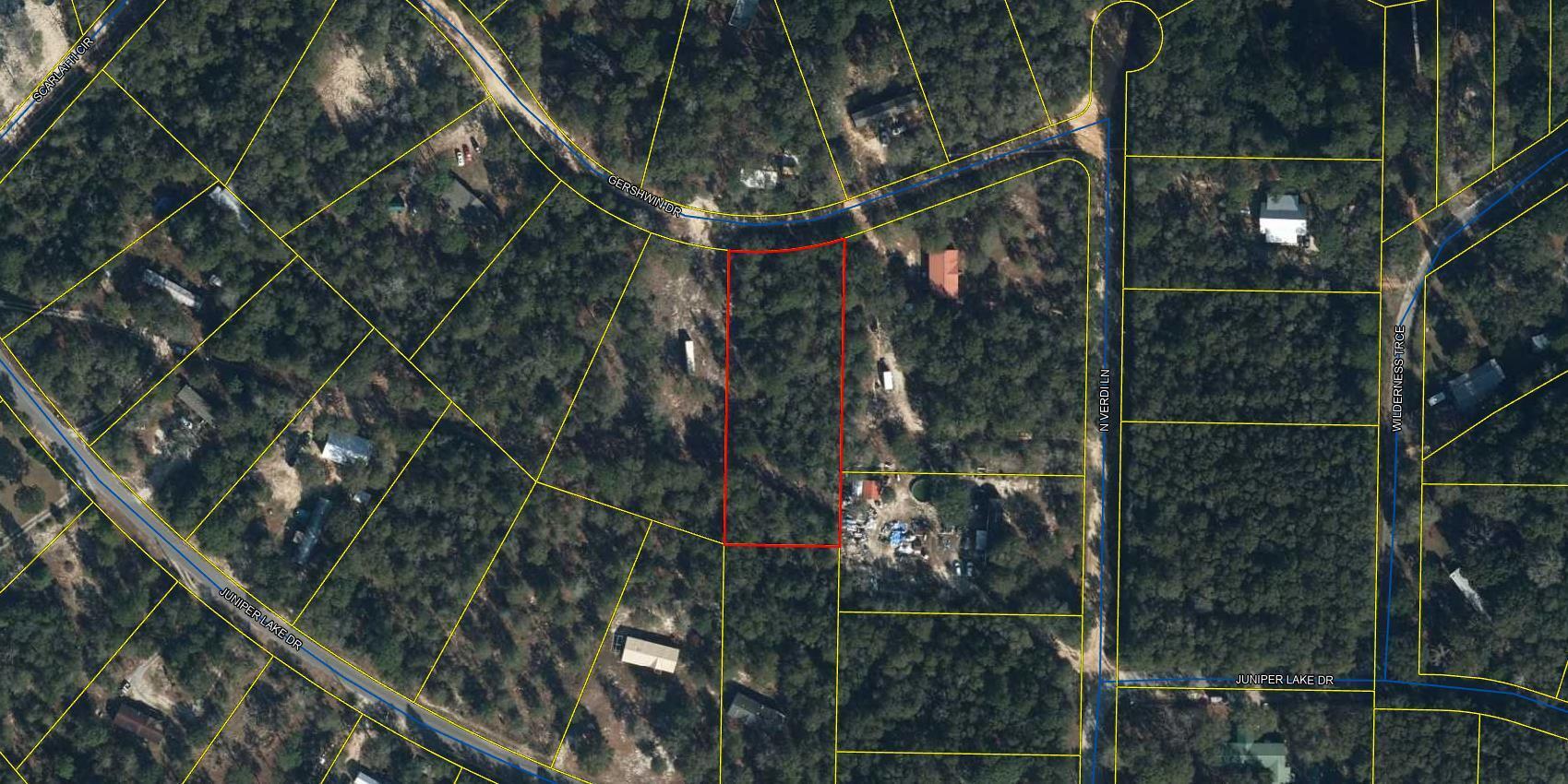 This 1 acre lot has been partially cleared with a driveway and ready for you to build your new home or manufactured home. City water is available in the area but tap fees have not been paid. This lot is centrally located in DeFuniak Springs, close to schools, parks and shopping. The road is also county maintained. Buyer to verify all measurements to own satisfaction. Motivated seller!
