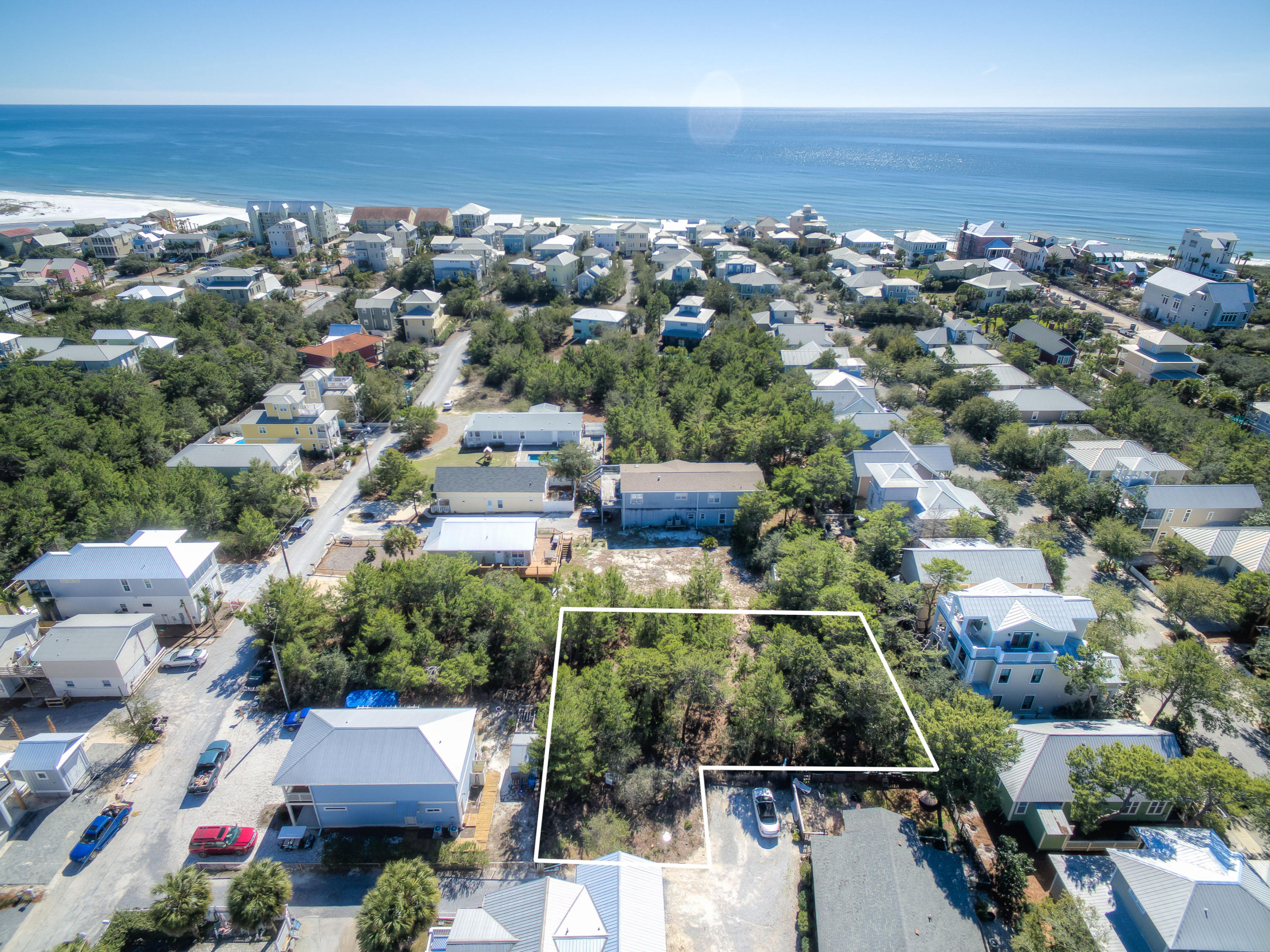 Absolute Old Seagrove Beach' charm! This lot is located south of 30A with 2 public accesses to the beach within a very short distance. Brown Street is centrally located to the beach, the best dining, unique boutique shopping, art galleries, art festivals, outdoor concerts, bike paths and some of the most challenging golf courses the gulf coast has to offer. Easy access to Hwy 98, allowing you to explore the nearby cities of Destin or Panama City Beach, as well as, the Northwest Florida Beaches International Airport. No HOA, build-out time, or design requirements. Several new homes have been recently built in this community. There is an additional 28'X 45' to the dimensions.