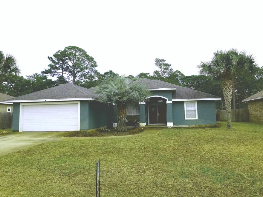 Only pool home listed in hidden pines.Enjoy living in this 3BR, 2 Bath home that is located minutes from the white, sandy beaches, schools, restaurants, and shopping without being in the thick of things and without having to drive to the west end of the beach. This is a great neighborhood for families, as Patronis Elementary School is within walking distance via the community trail and is also convenient for professionals and retirees.Built in 2004, the exterior is similar to that of many of the neighbors' homes, however the interior of this 1948-square-foot home is anything but cookie cutter with arches, curves, and chair rails adding European charm. This lovely beach home, has 10-foot ceilings in the great room, and 18-inch tiles throughout the main rooms.