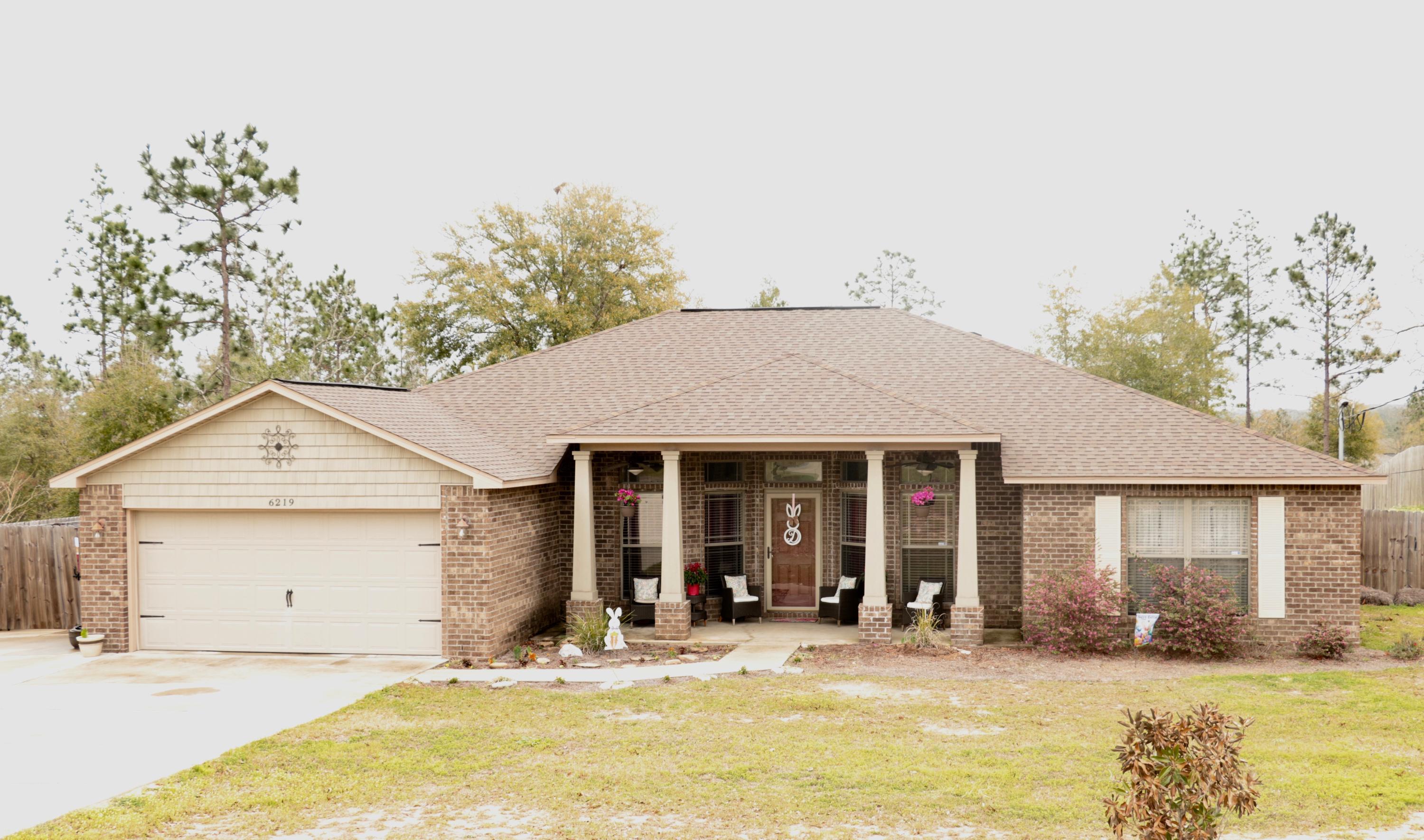 This spacious home has 4 bedrooms/3 bathrooms and sits on .62 of an acre. The kitchen has granite counter tops, an island, a walk in pantry, and stainless steel appliances. The kitchen also has maple cabinets with crown molding. This home has a split bedroom floor plan. The master bathroom has 2 walk in closets , a double vanity, a soaker tub and a separate shower. All additional rooms have over sized closets and ceiling fans. The den can be made into an office or an additional space to suite your needs. The additional concrete slab on the side and on the back of the home is spacious enough to fit a boat. The large fenced-in yard offers privacy and plenty of room for outdoor activity.