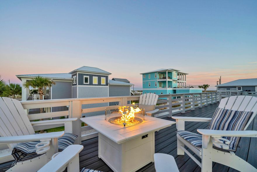 Introducing a coastal paradise on Navarre Beach! With exquisite, unobstructed views of Santa Rosa Sound, this amazing beach home offers the perfect blend of comfort, style, and stunning coastal beauty. This 3 bedroom, 2 bath home boasts awe-inspiring views of both the Gulf of Mexico and Santa Rosa Sound, where you're sure to find serenity and relaxation at every turn. Step inside to discover open-concept living space, thoughtfully designed for entertaining and maximizing those picturesque views. The kitchen offers ample cabinets with modern appliances and an island for casual dining. Two additional bedrooms are located on the main level. Located on the 3rd floor is a spacious master suite, complete with en-suite bath and double walk-in closets providing a private oasis for homeowners. The